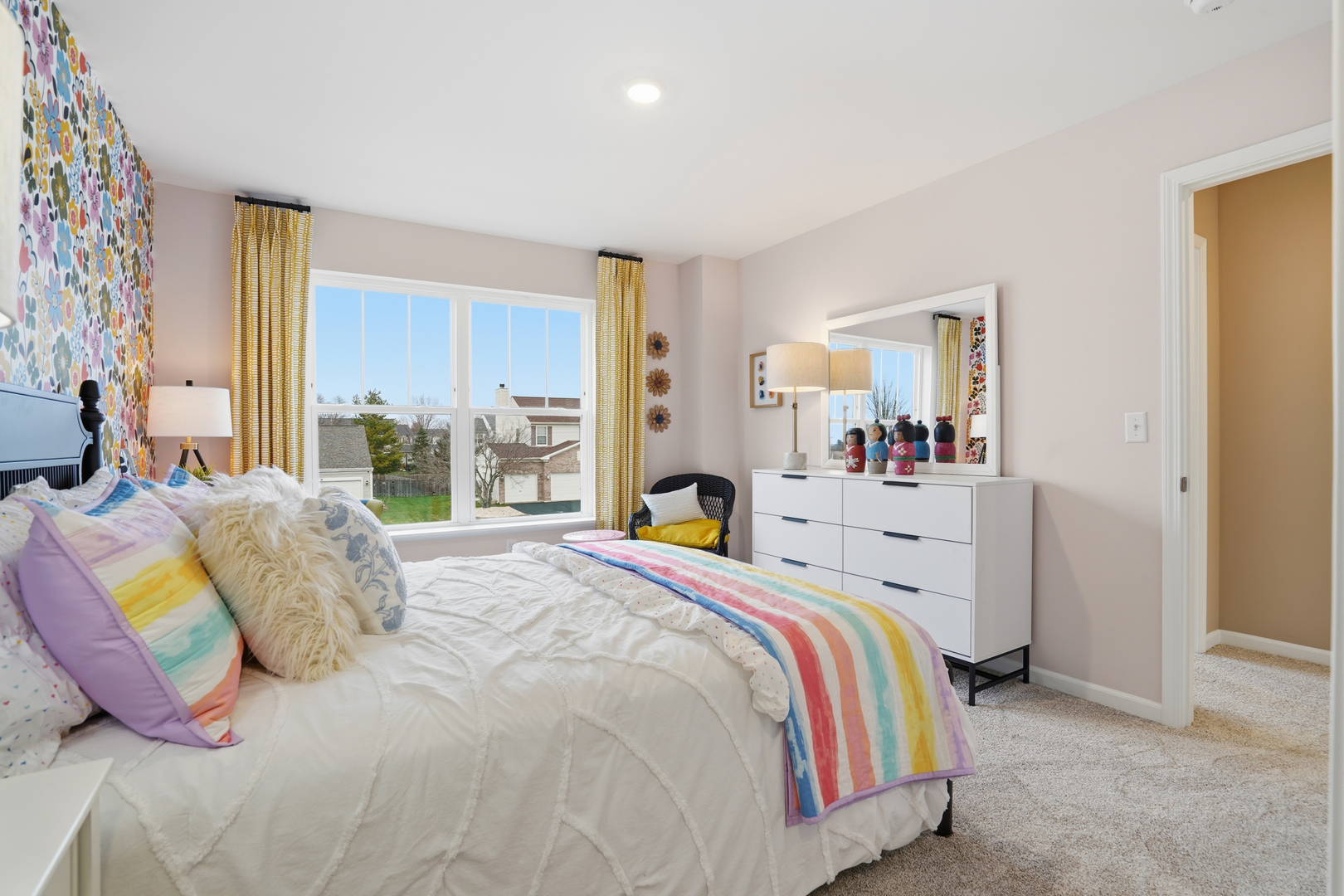 379 Danforth Drive Oswego, IL 60543 - Photo 15 of 20 a bedroom with a bed and a large mirror