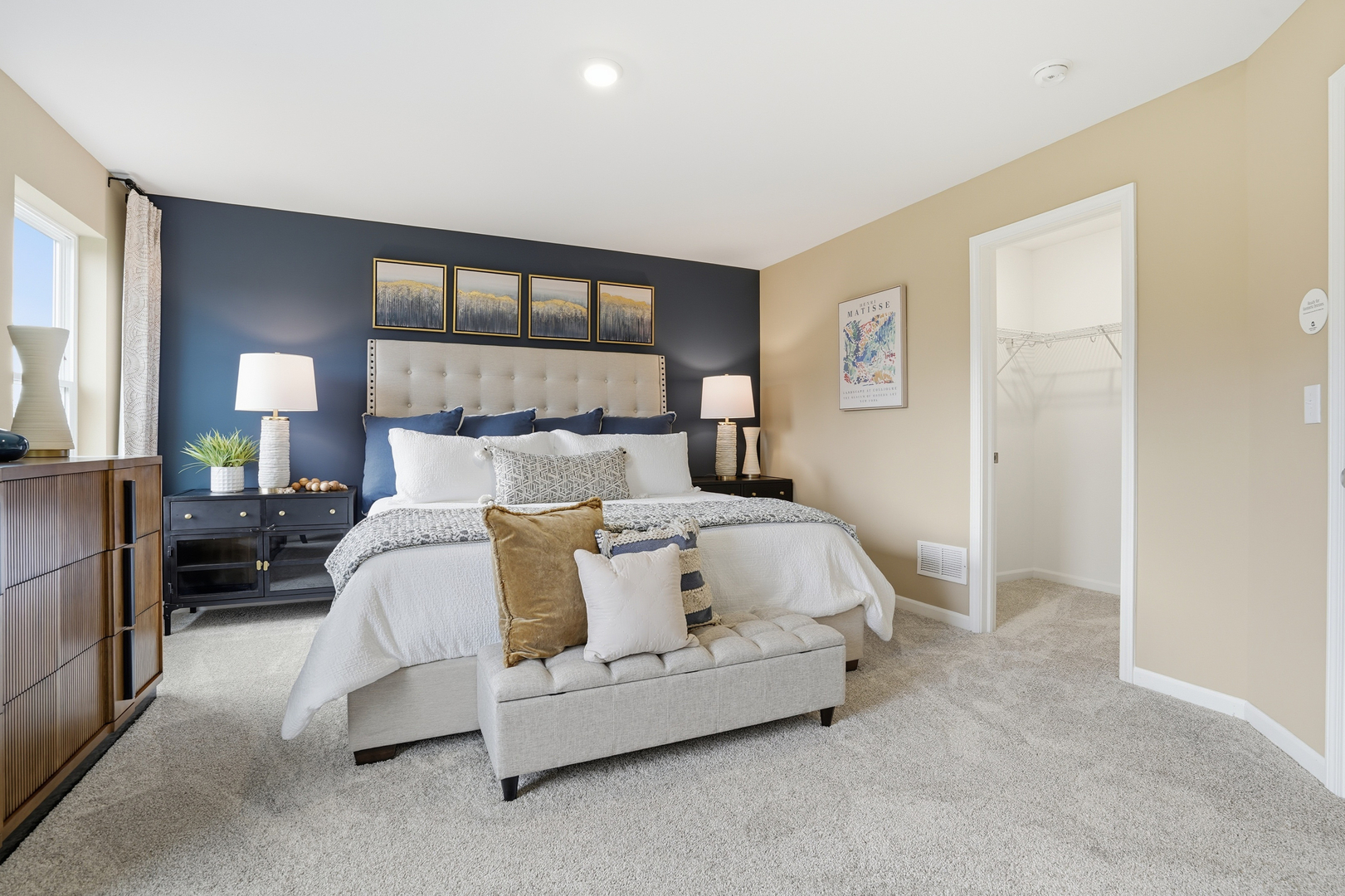 379 Danforth Drive Oswego, IL 60543 - Photo 9 of 20 a bed room with a bed and a night stand