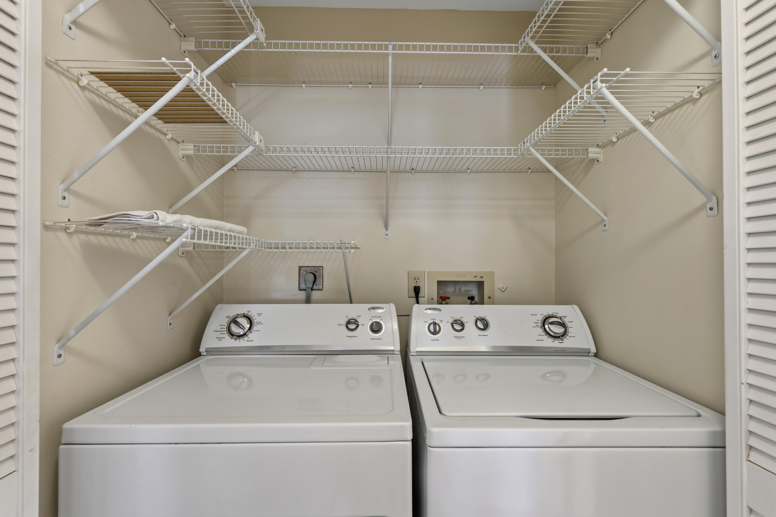 7873 Southeast Sugar Sand Circle Hobe Sound, FL 33455 - Photo 23 of 35 a utility room with dryer and washer