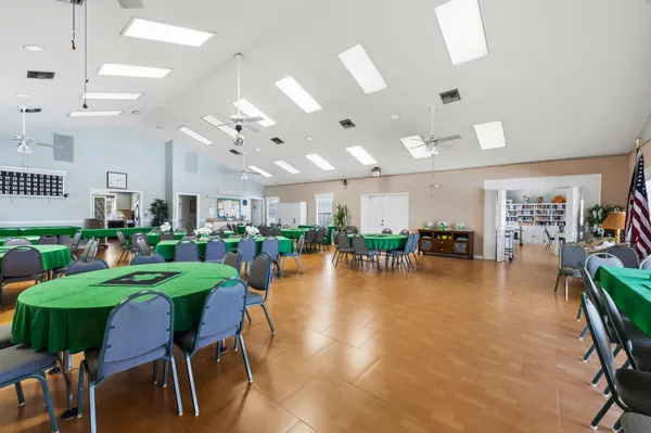 a kitchen with a table and chairs