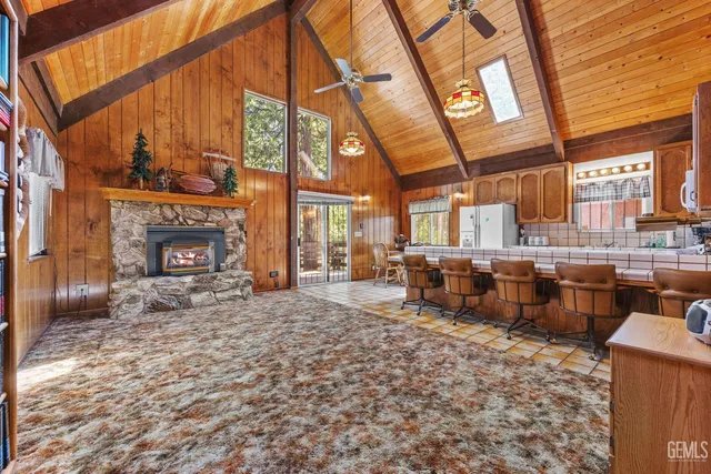 a large room with a fireplace in it