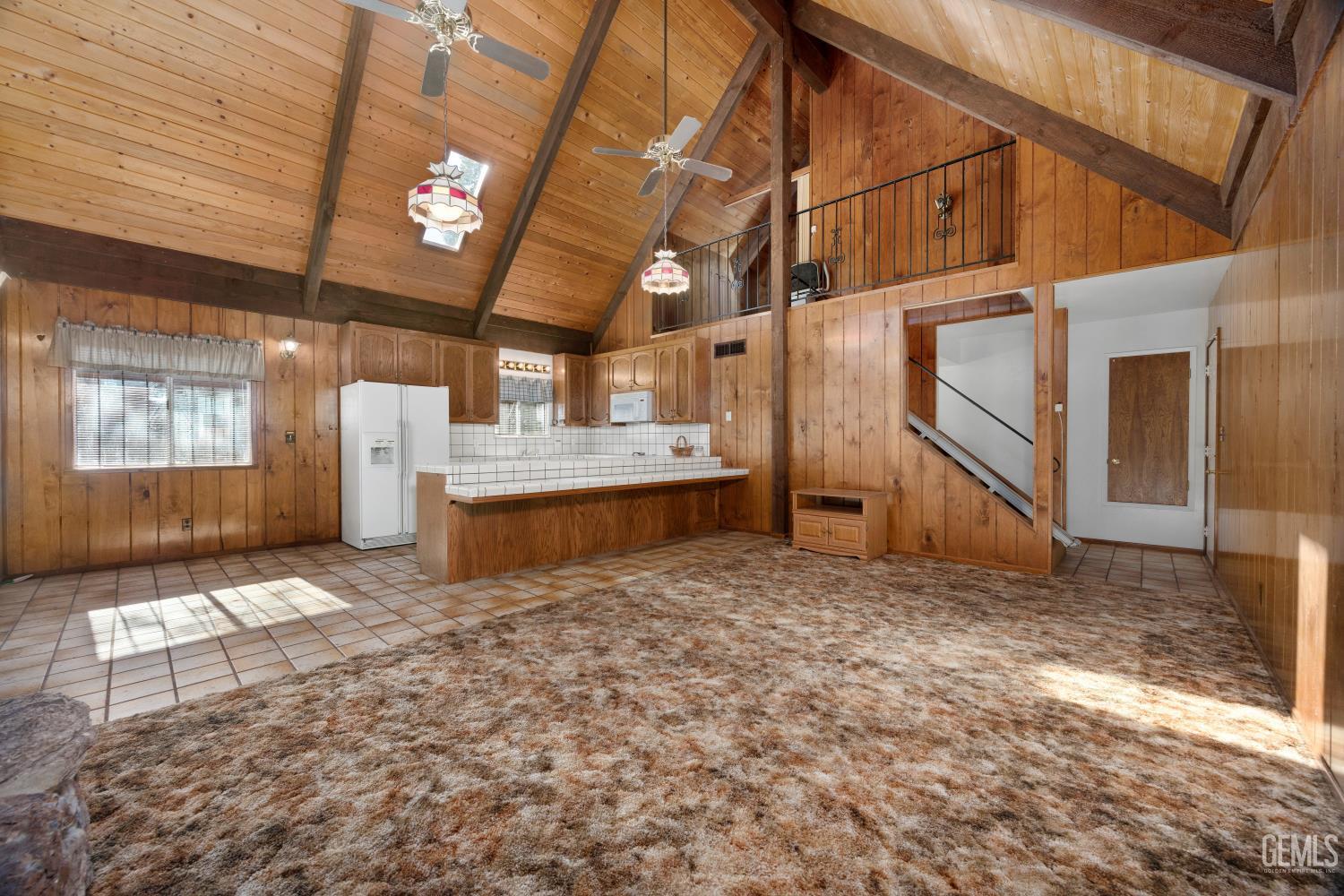 Undisclosed Address Wofford Heights, CA 93285 - Photo 17 of 26 a view of an empty room with a fireplace