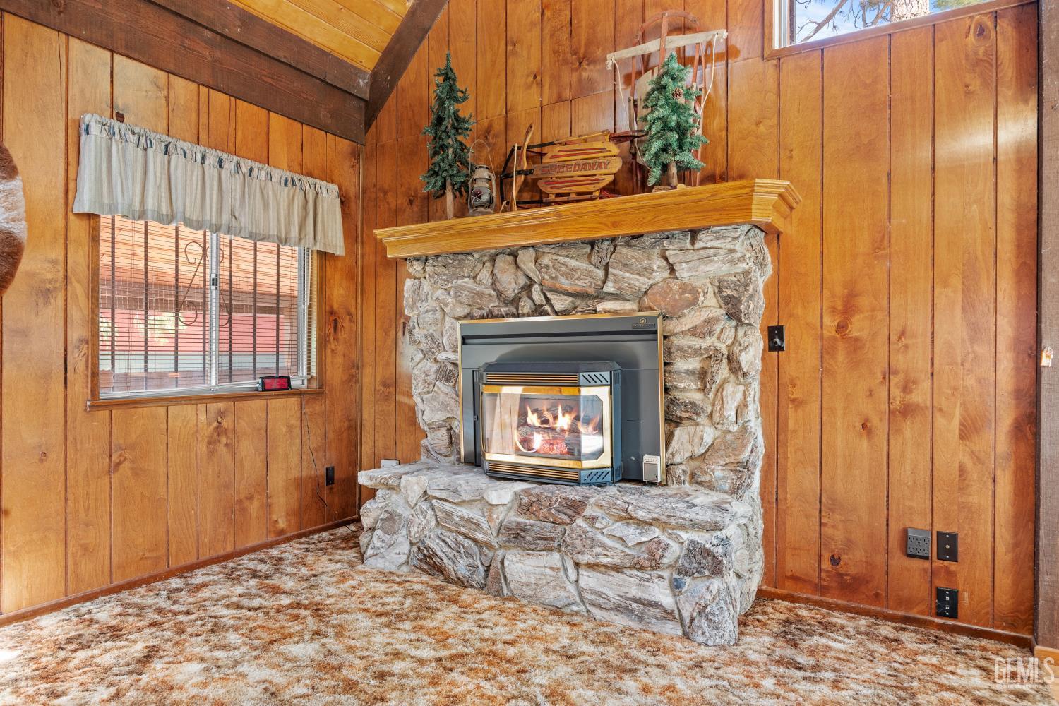 Undisclosed Address Wofford Heights, CA 93285 - Photo 7 of 26 a bedroom with a bed and a fireplace