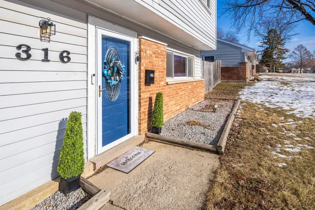a front view of a house with a porch