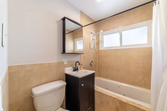 a front view of a house with a garage