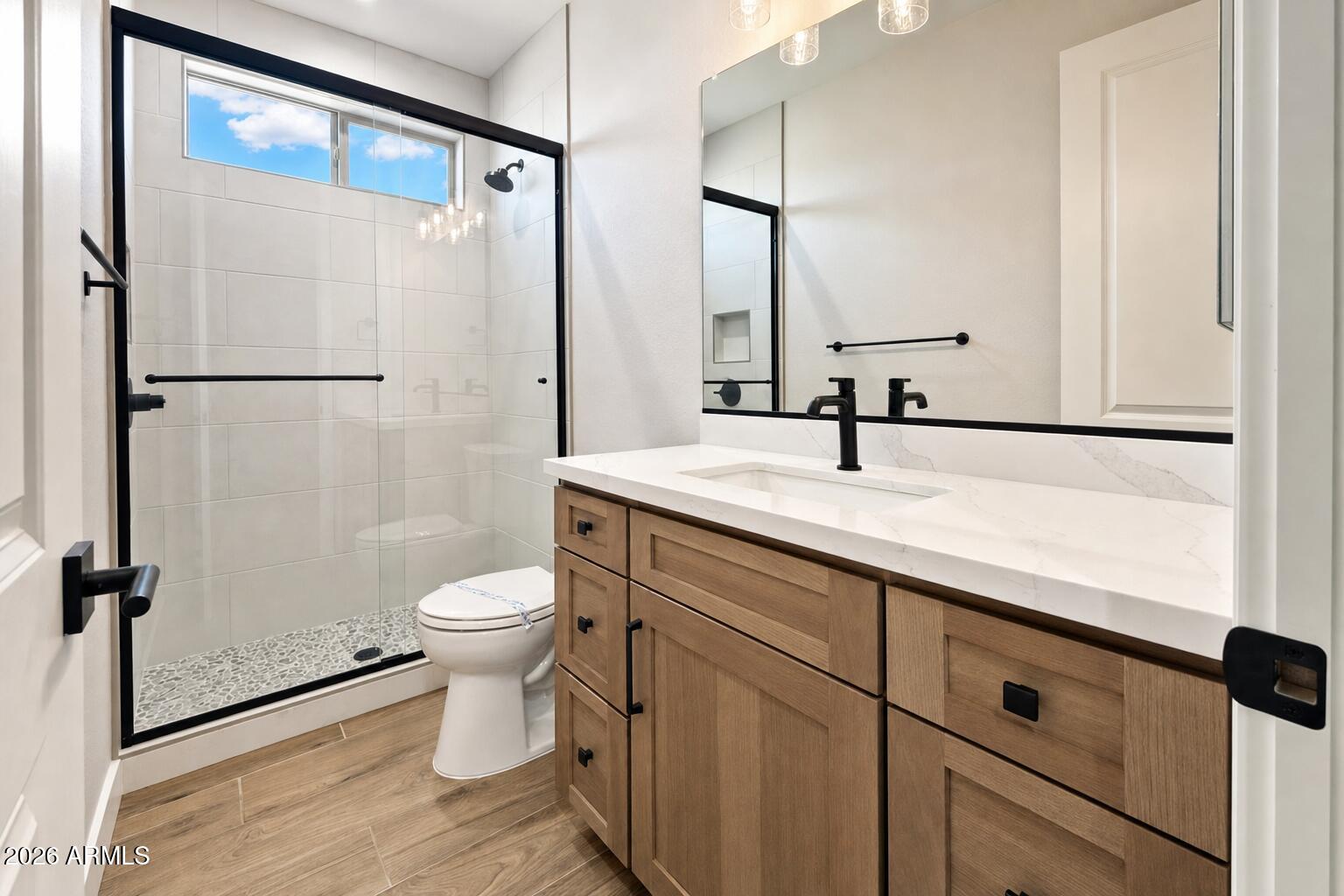 16957 East Bobwhite Way Rio Verde, AZ 85263 - Photo 13 of 25 a bathroom with a sink toilet and shower