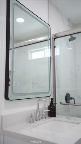 a bathroom with a mirror