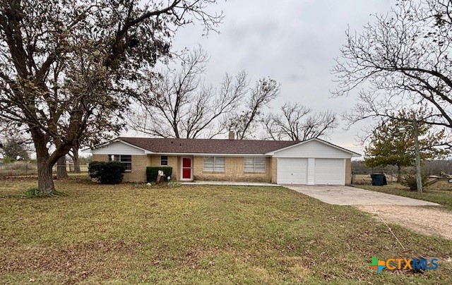 9681 Highway 53 Temple, TX 76501 - Photo 2 of 20 a front view of a house with a yard covered in snow