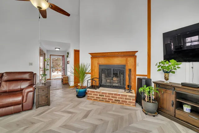 a kitchen with stainless steel appliances granite countertop a stove a sink a refrigerator and a refrigerator