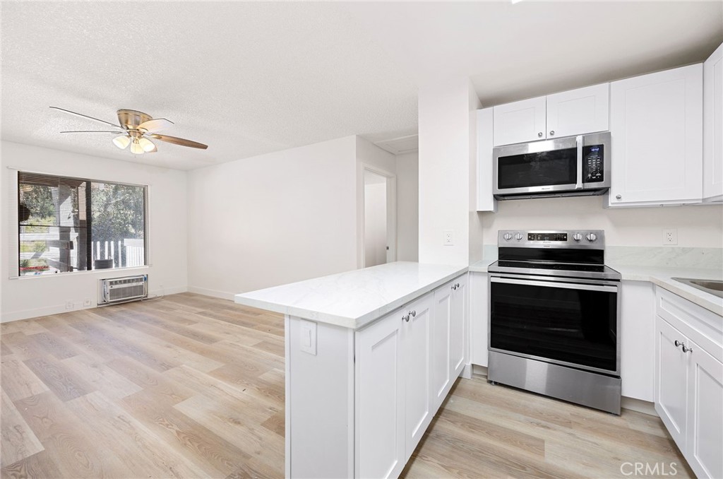 6386 Rancho Mission Road, Unit 318 San Diego, CA 92108 - Photo 10 of 21 Newly Remodeled - Kitchen Cabinets, Counters & Appliances
