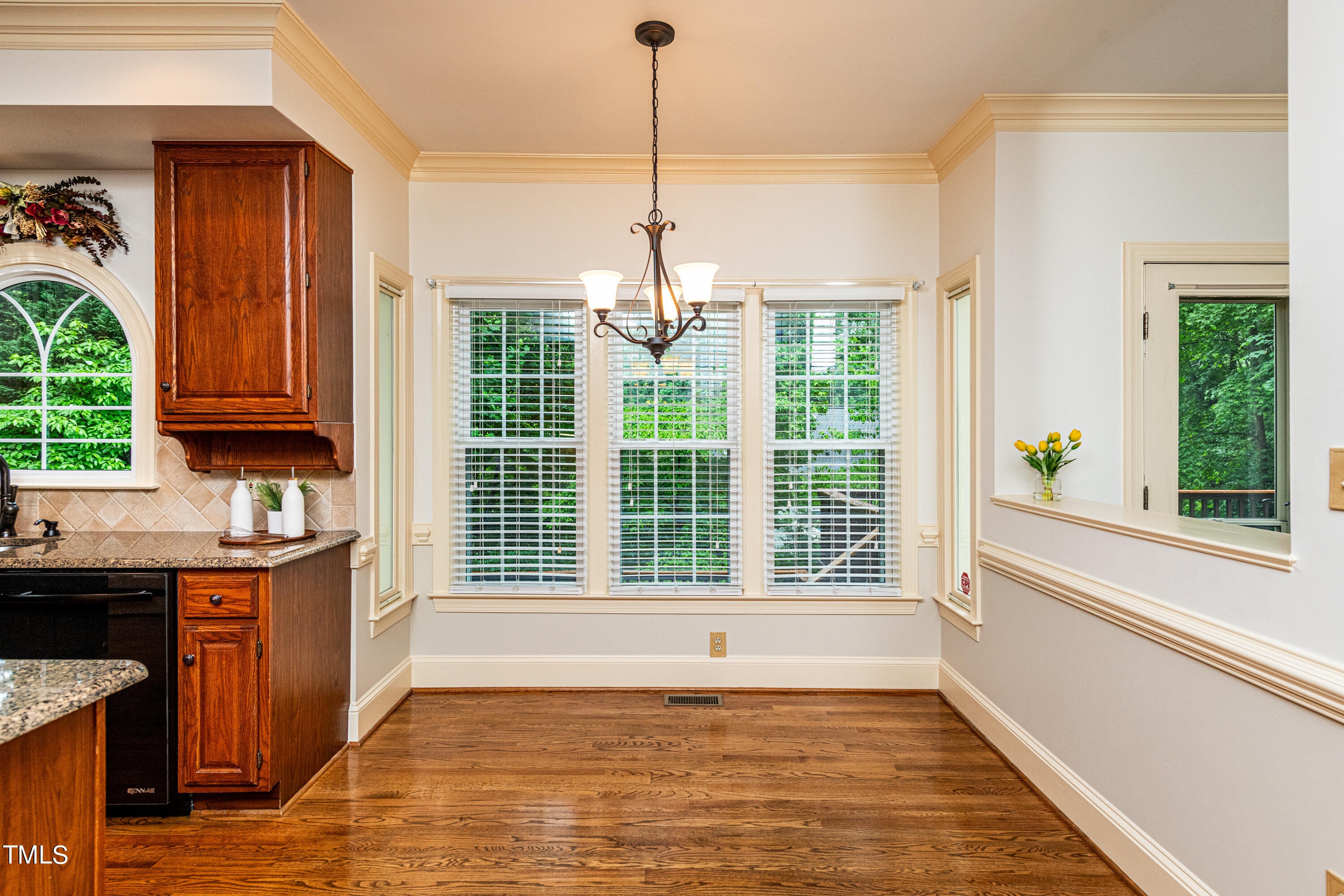104 Kettlebridge Drive Cary, NC 27511 - Photo 18 of 48 a view of a kitchen with a sink and cabinets