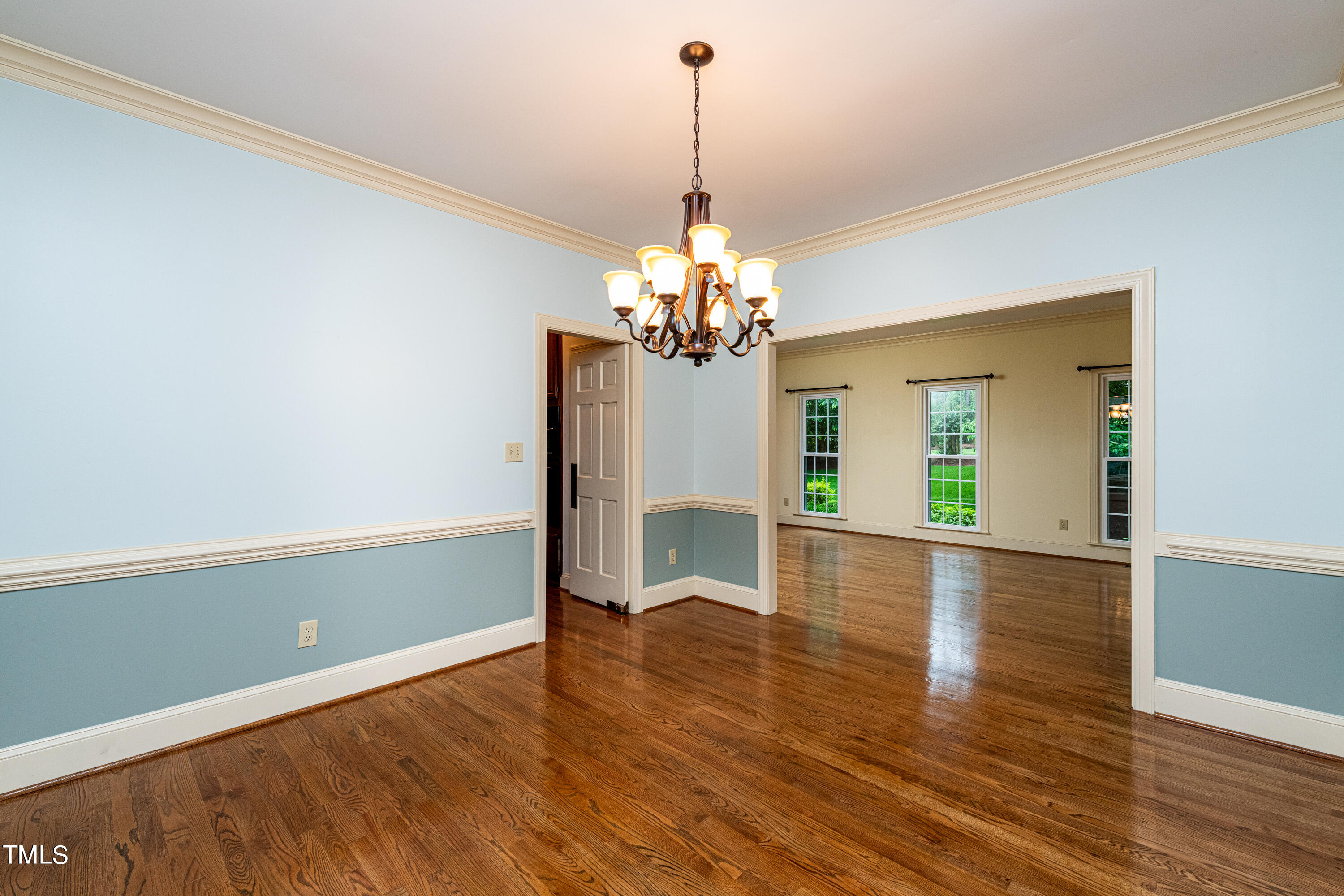 104 Kettlebridge Drive Cary, NC 27511 - Photo 20 of 48 a view of a room with wooden floor chandelier and entryway