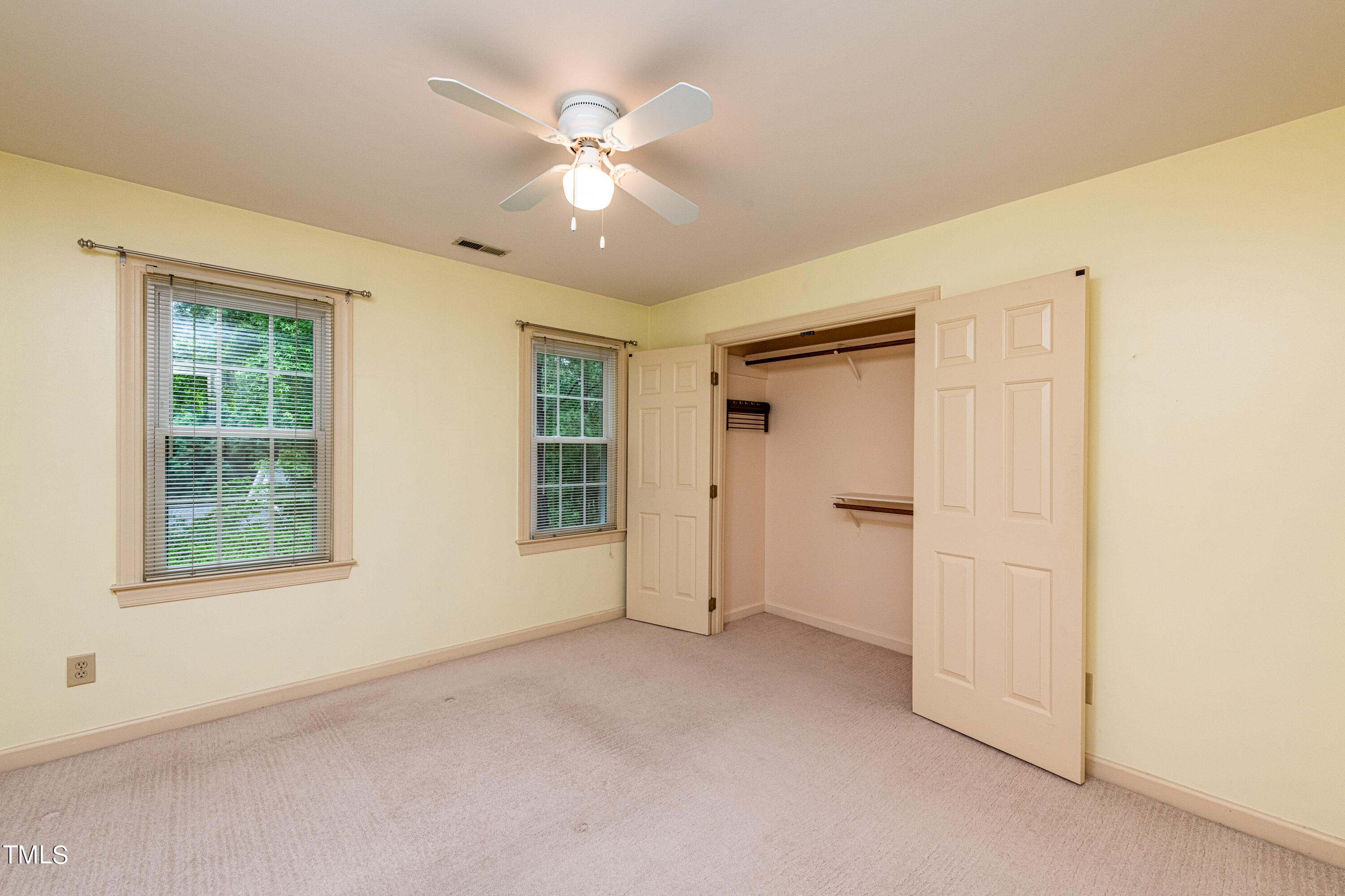 104 Kettlebridge Drive Cary, NC 27511 - Photo 32 of 48 an empty room with windows and closet