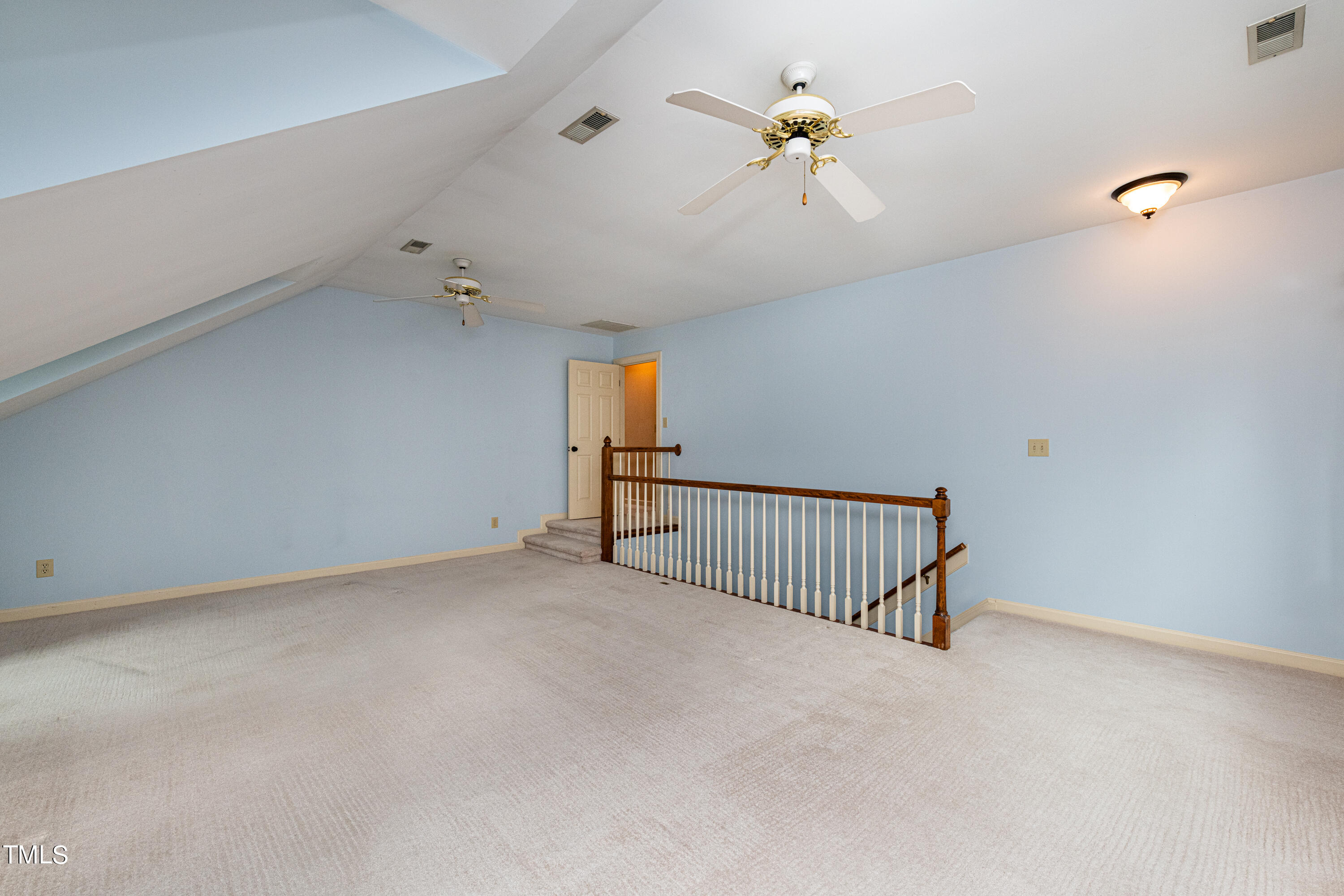 104 Kettlebridge Drive Cary, NC 27511 - Photo 37 of 48 en empty room with ceiling fan and window