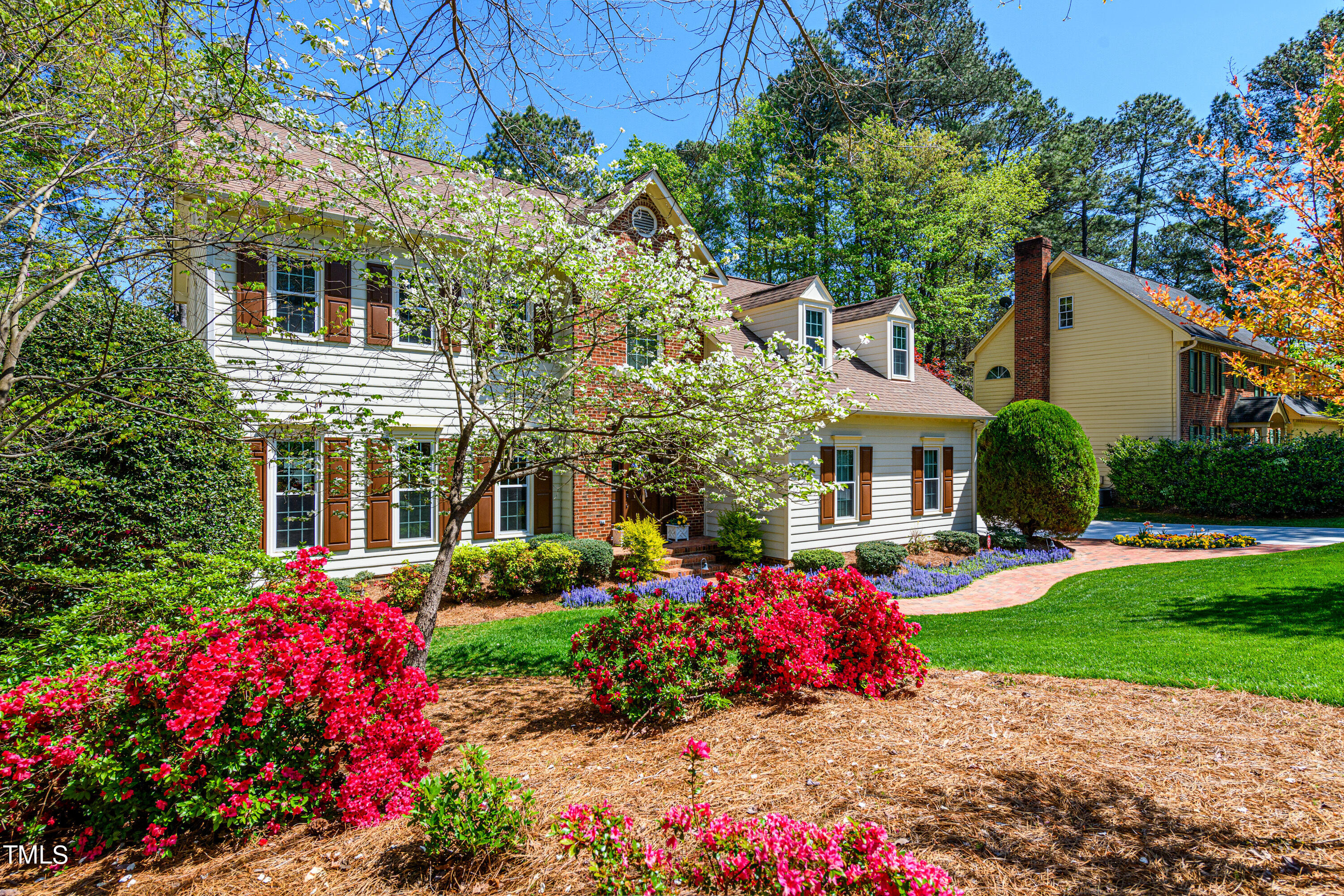 104 Kettlebridge Drive Cary, NC 27511 - Photo 6 of 48 a view of a house with a garden