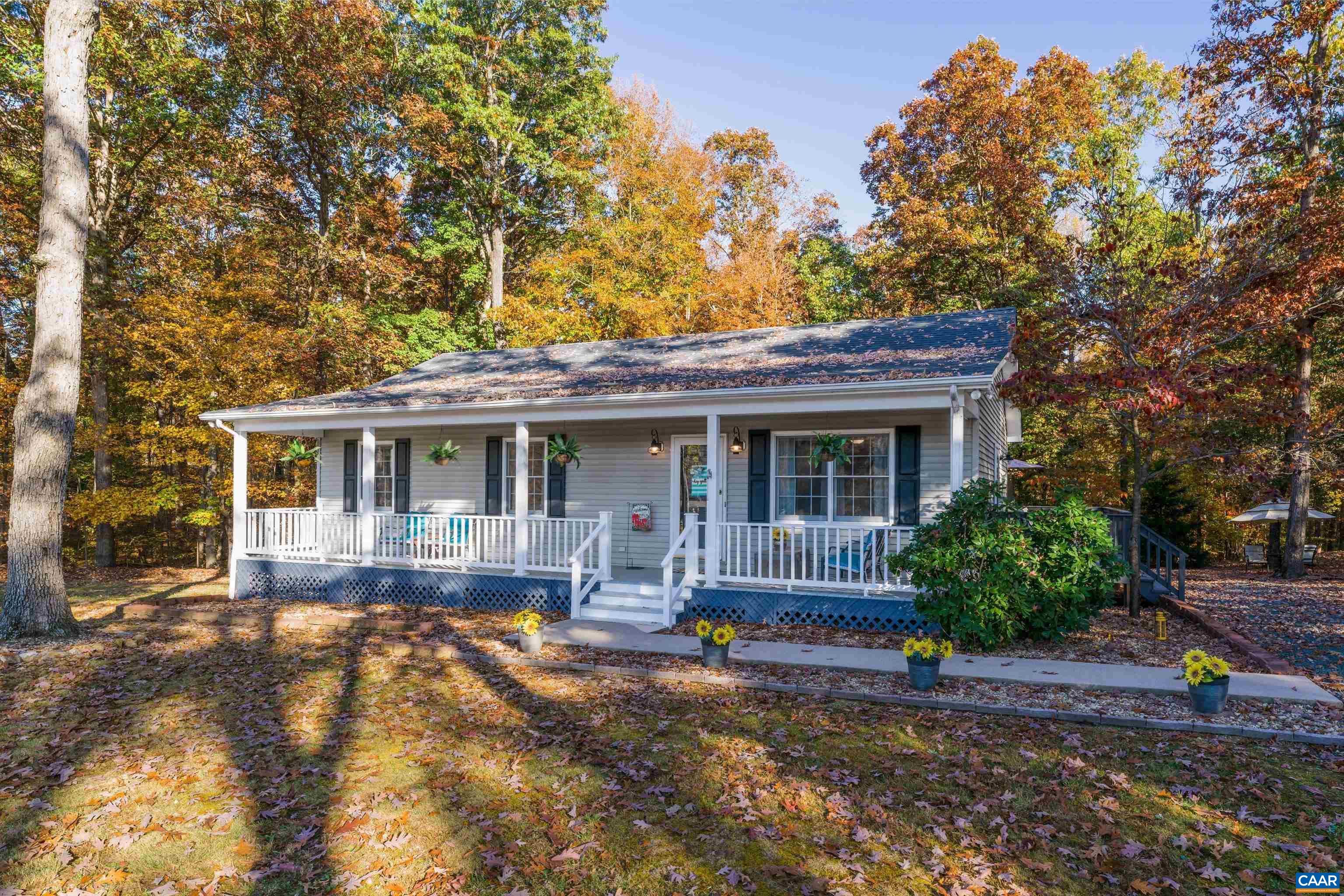 2321 Ruritan Lake Road Scottsville, VA 24590 - Photo 1 of 35 a front view of a house with garden