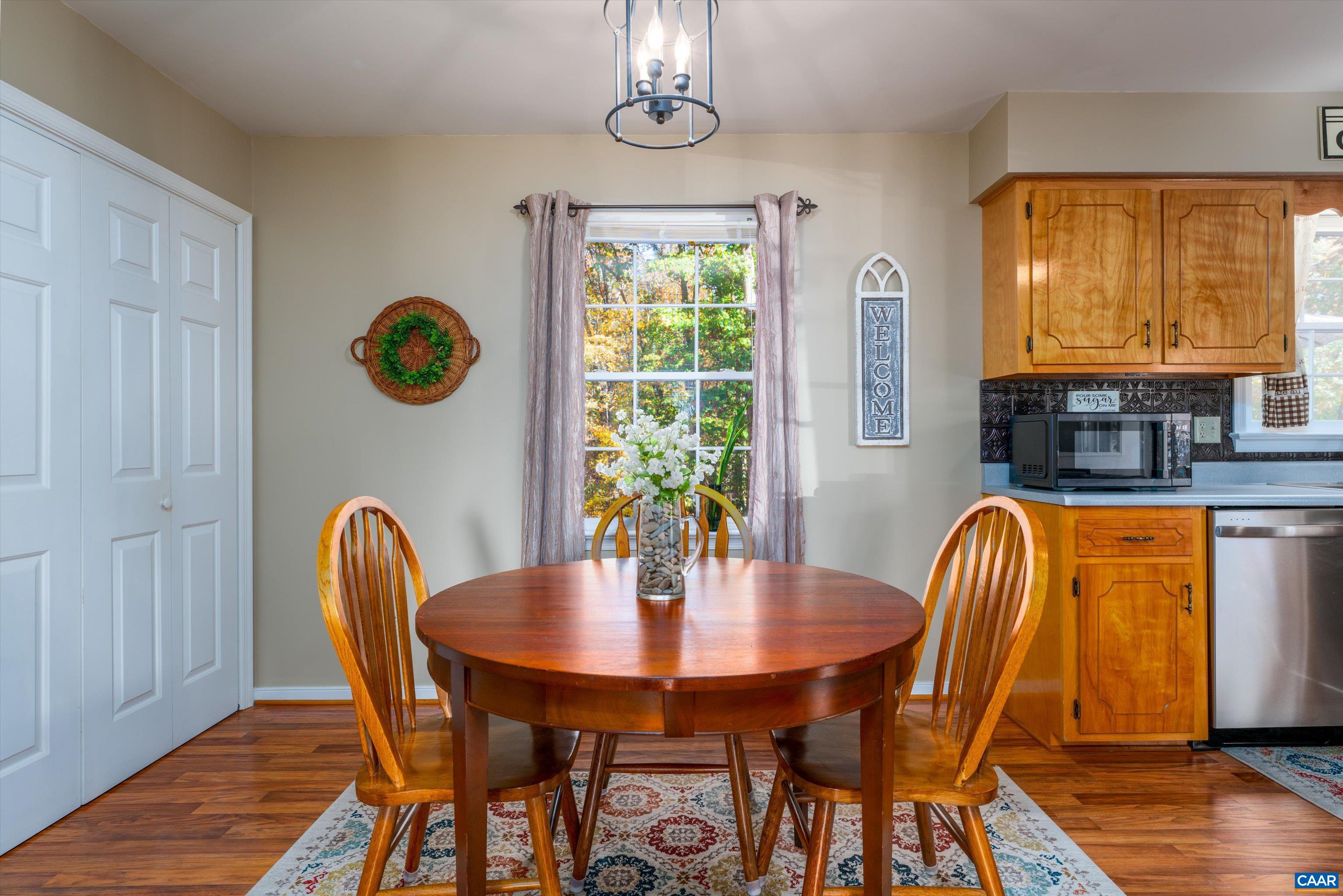 2321 Ruritan Lake Road Scottsville, VA 24590 - Photo 11 of 35 a dining room with furniture and window