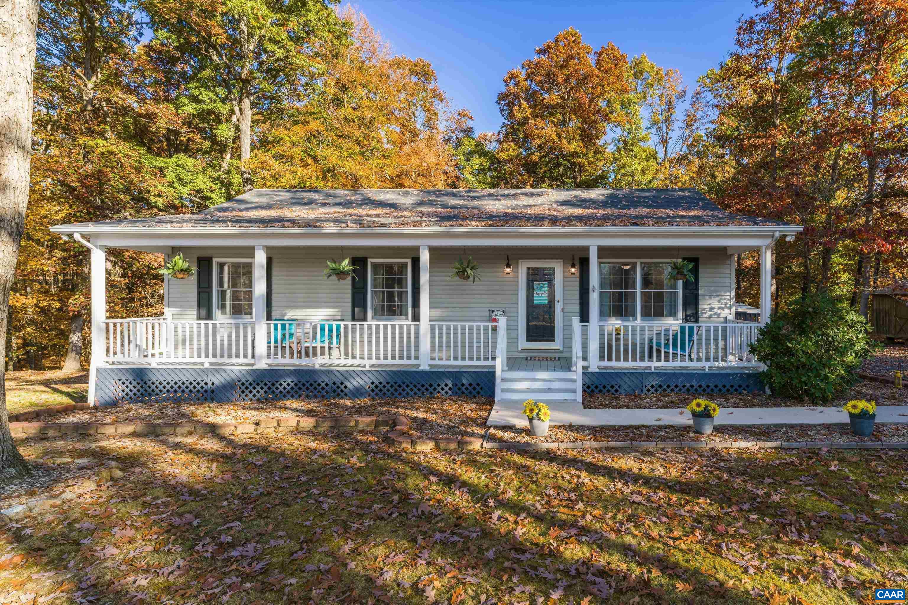 2321 Ruritan Lake Road Scottsville, VA 24590 - Photo 2 of 35 a front view of a house with a garden