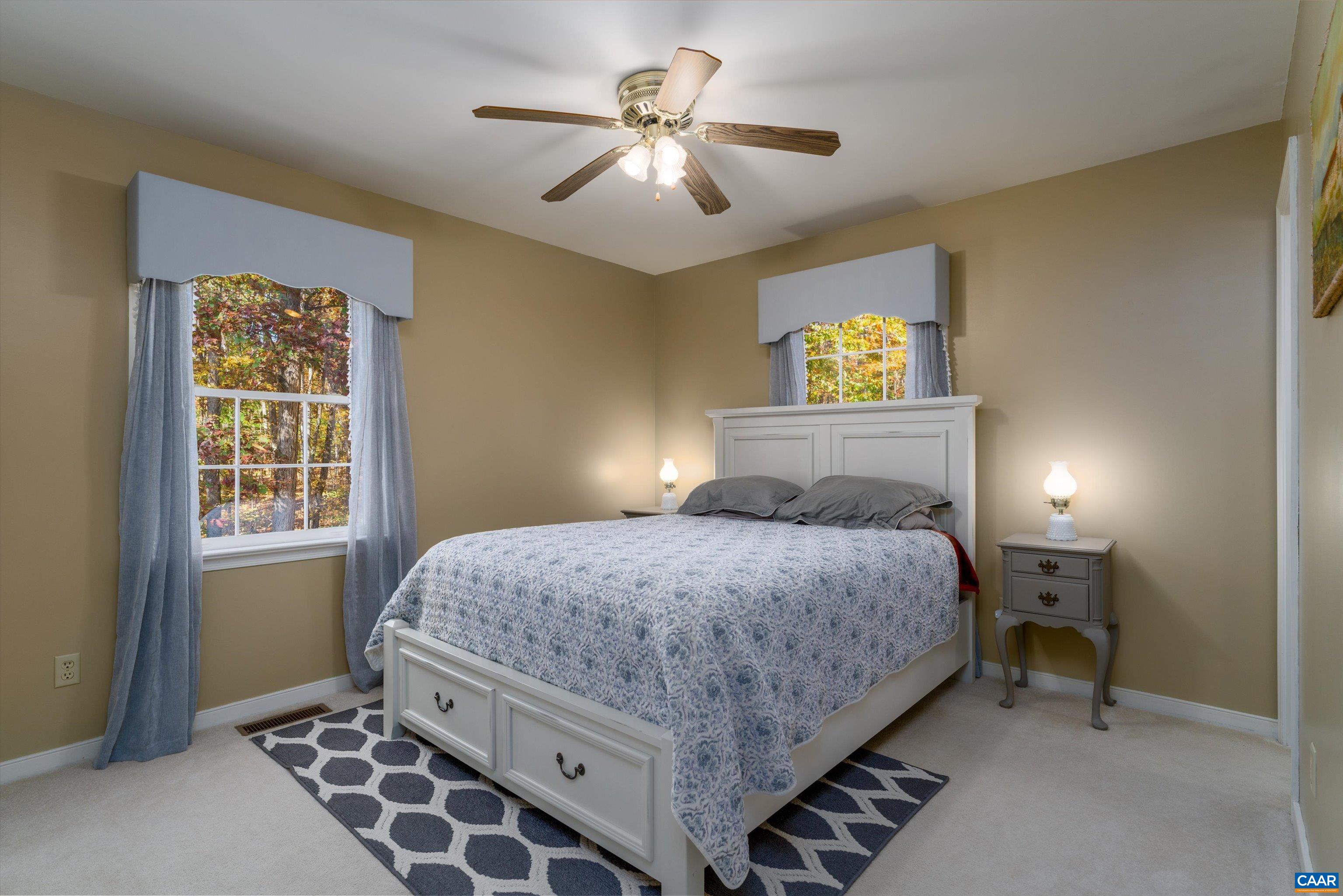 2321 Ruritan Lake Road Scottsville, VA 24590 - Photo 22 of 35 a bedroom with bed and window