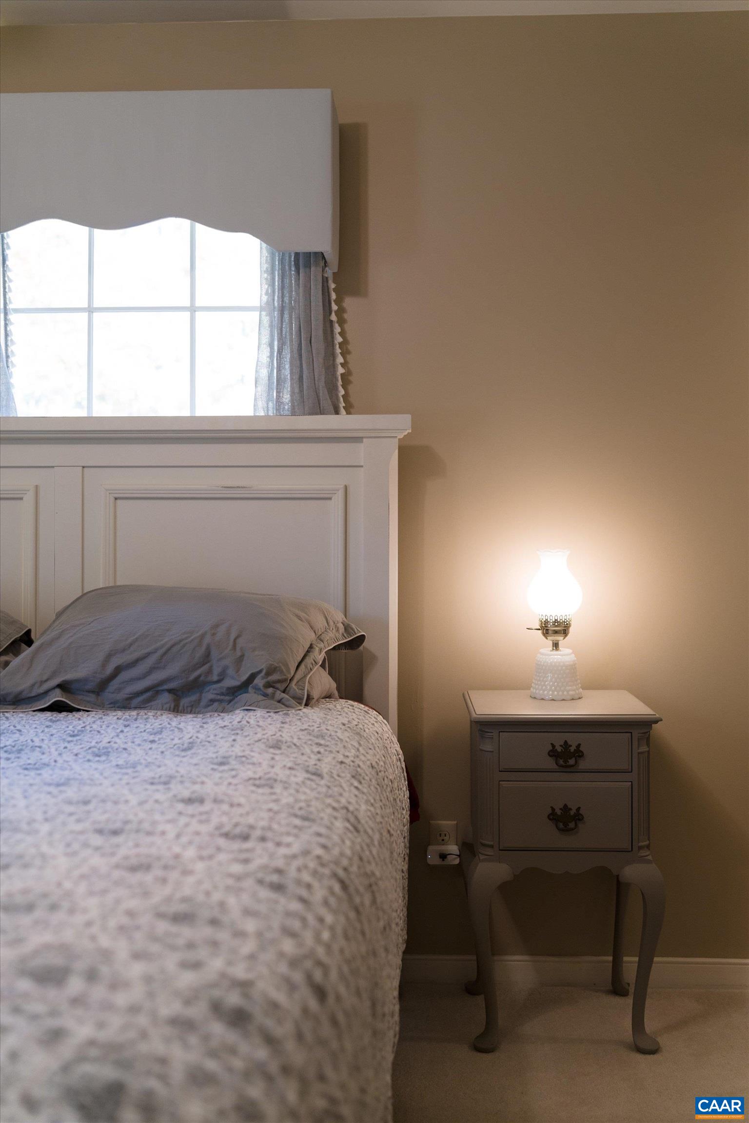2321 Ruritan Lake Road Scottsville, VA 24590 - Photo 24 of 35 a room with a bed and a window