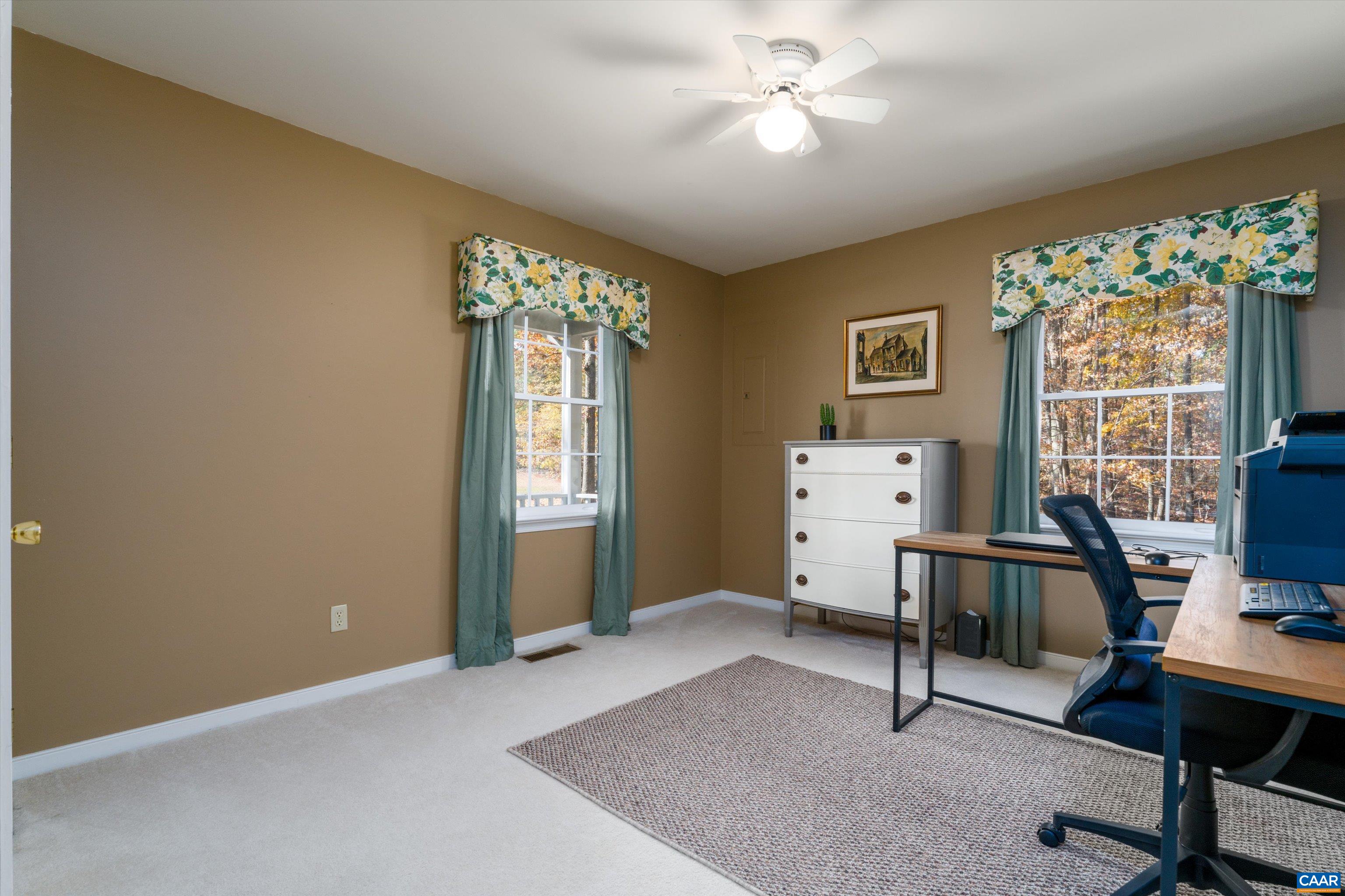 2321 Ruritan Lake Road Scottsville, VA 24590 - Photo 27 of 35 a view of a workspace with furniture and a window