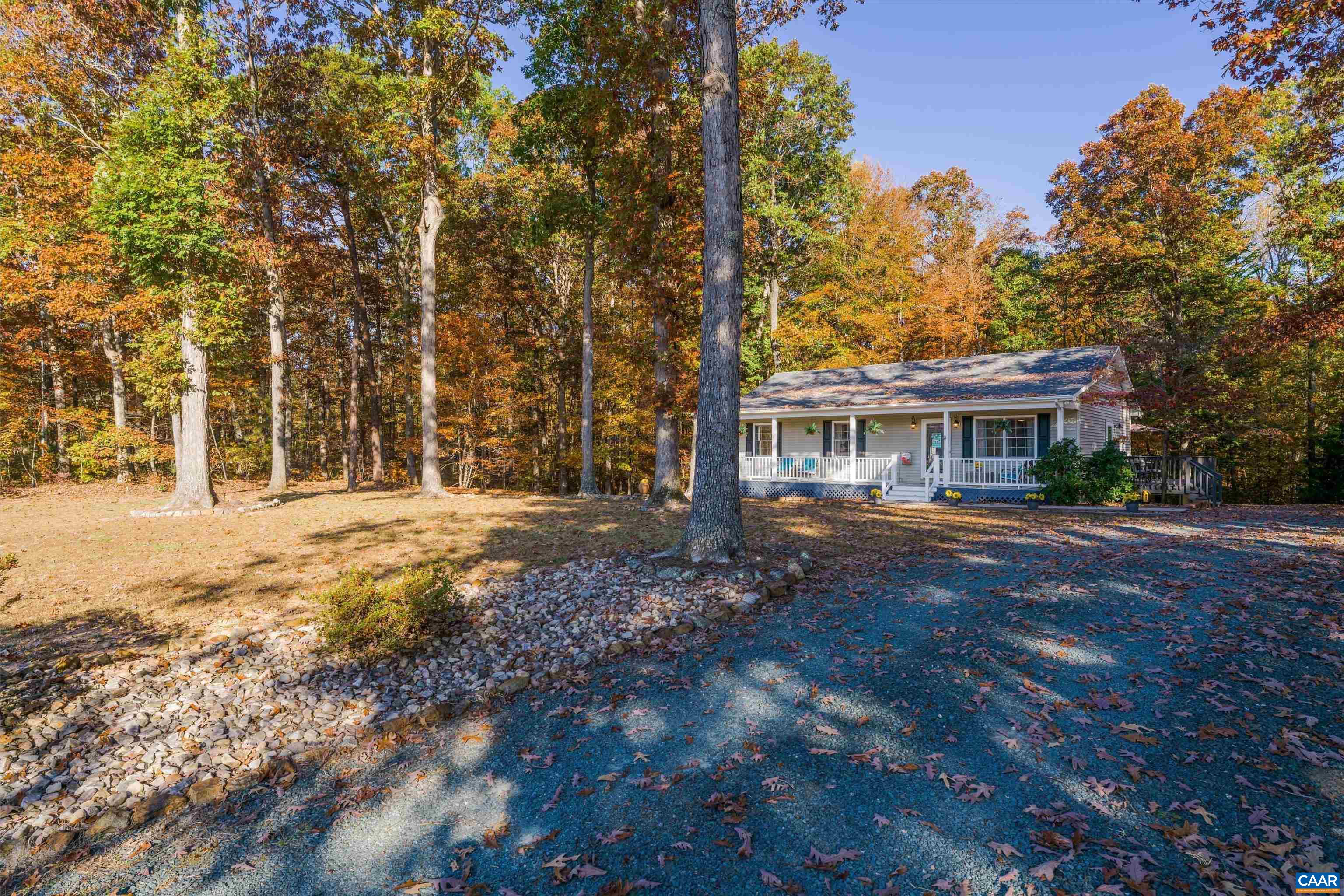 2321 Ruritan Lake Road Scottsville, VA 24590 - Photo 5 of 35 a view of house with outdoor space and garden