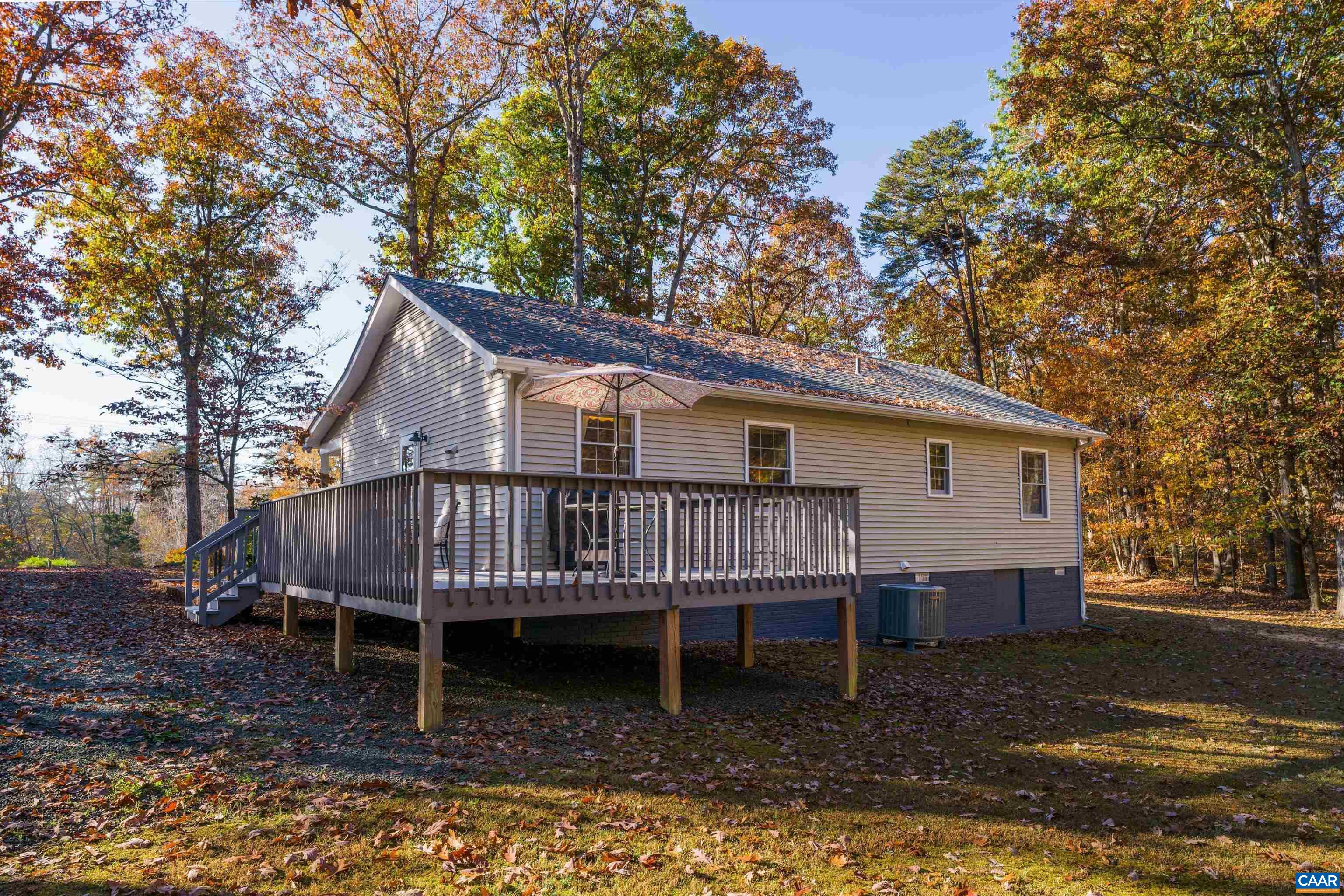 2321 Ruritan Lake Road Scottsville, VA 24590 - Photo 6 of 35 a view of a house with a yard and sitting area