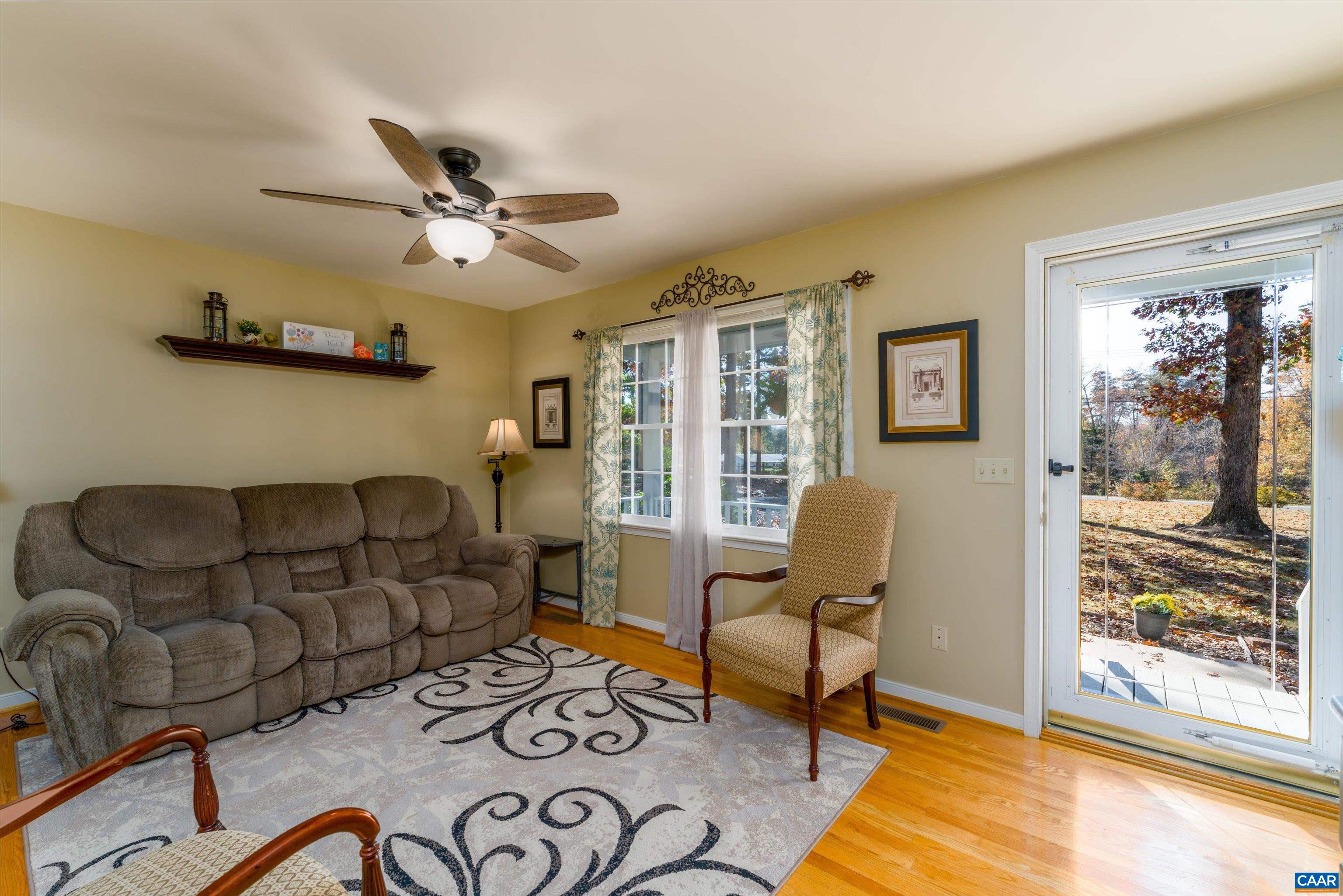 2321 Ruritan Lake Road Scottsville, VA 24590 - Photo 7 of 35 a living room with furniture and a window
