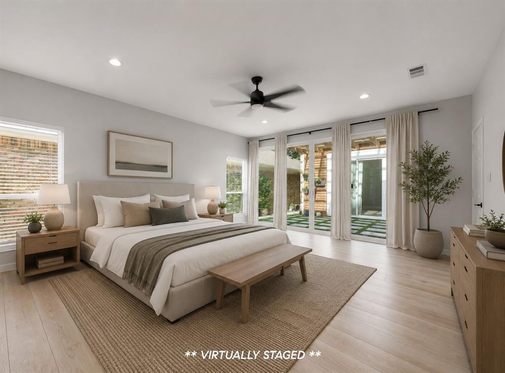 14140 Regency Place Dallas, TX 75254 - Photo 20 of 38 Spacious room with wood-finish flooring and recessed lighting