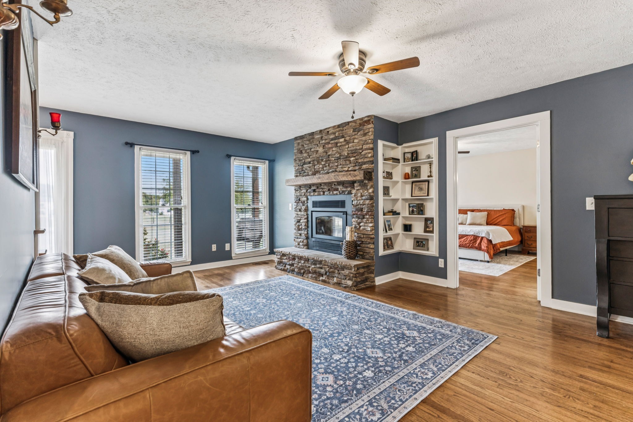 2550 Thompson Road Murfreesboro, TN 37128 - Photo 17 of 45 a living room with furniture ceiling fan and a rug