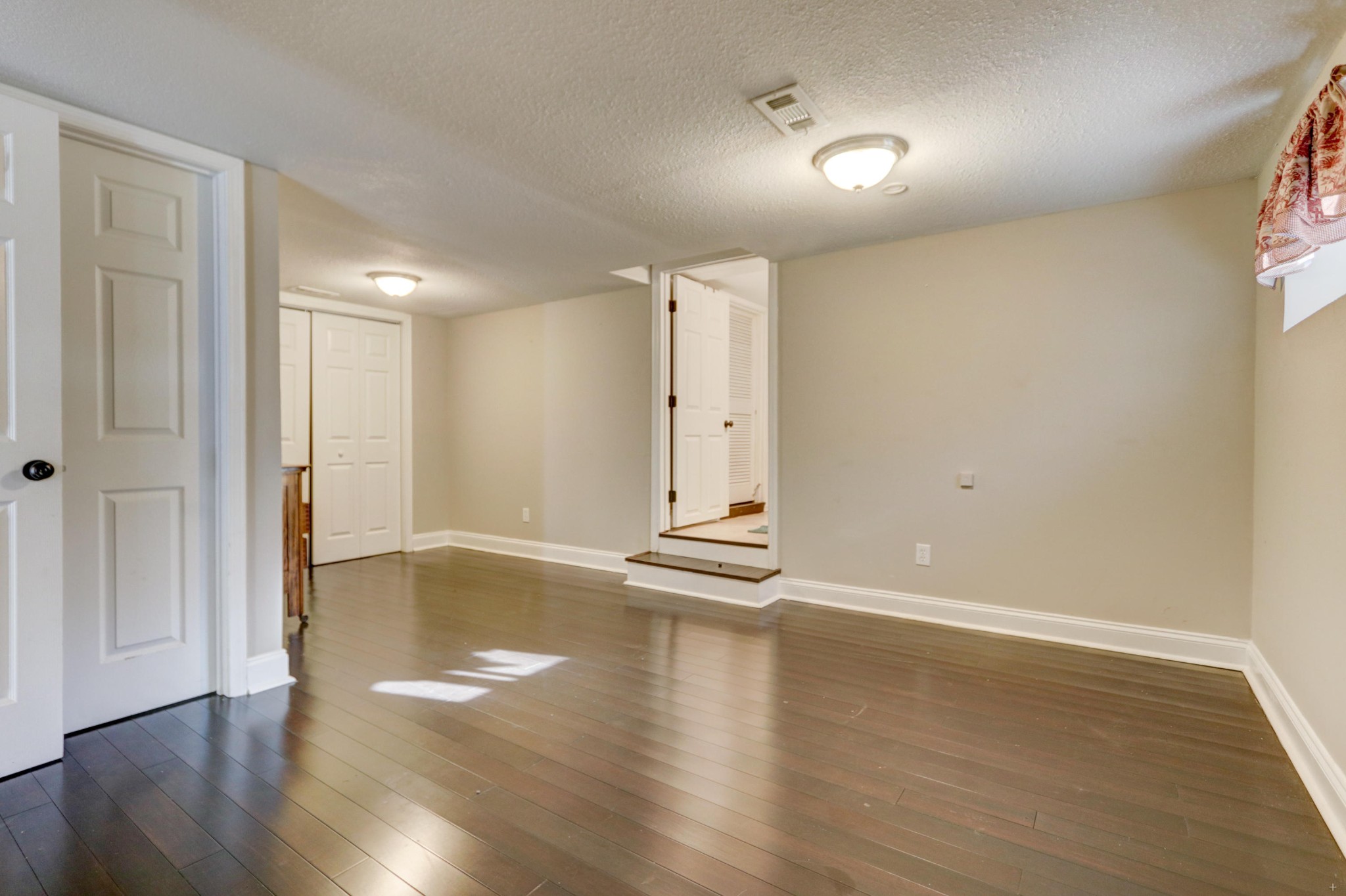 1210 Foust Carney Road Powell, TN 37849 - Photo 17 of 23 a view of empty room with wooden floor