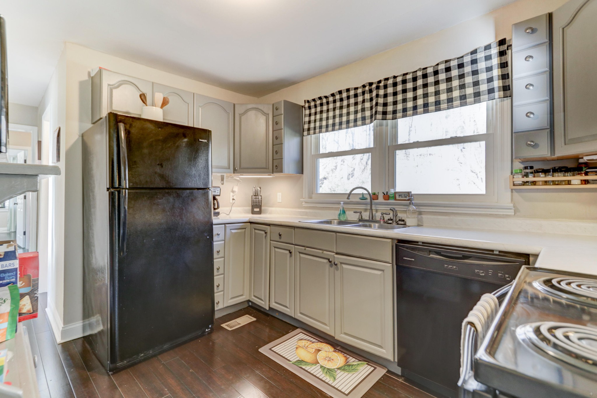 1210 Foust Carney Road Powell, TN 37849 - Photo 6 of 23 a kitchen with a sink stove and refrigerator