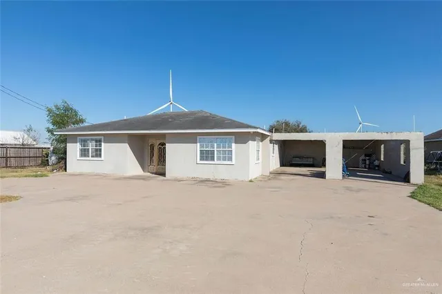 a front view of a house with a garage
