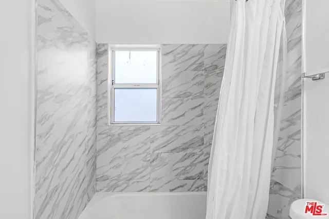 a bathroom with a bathtub