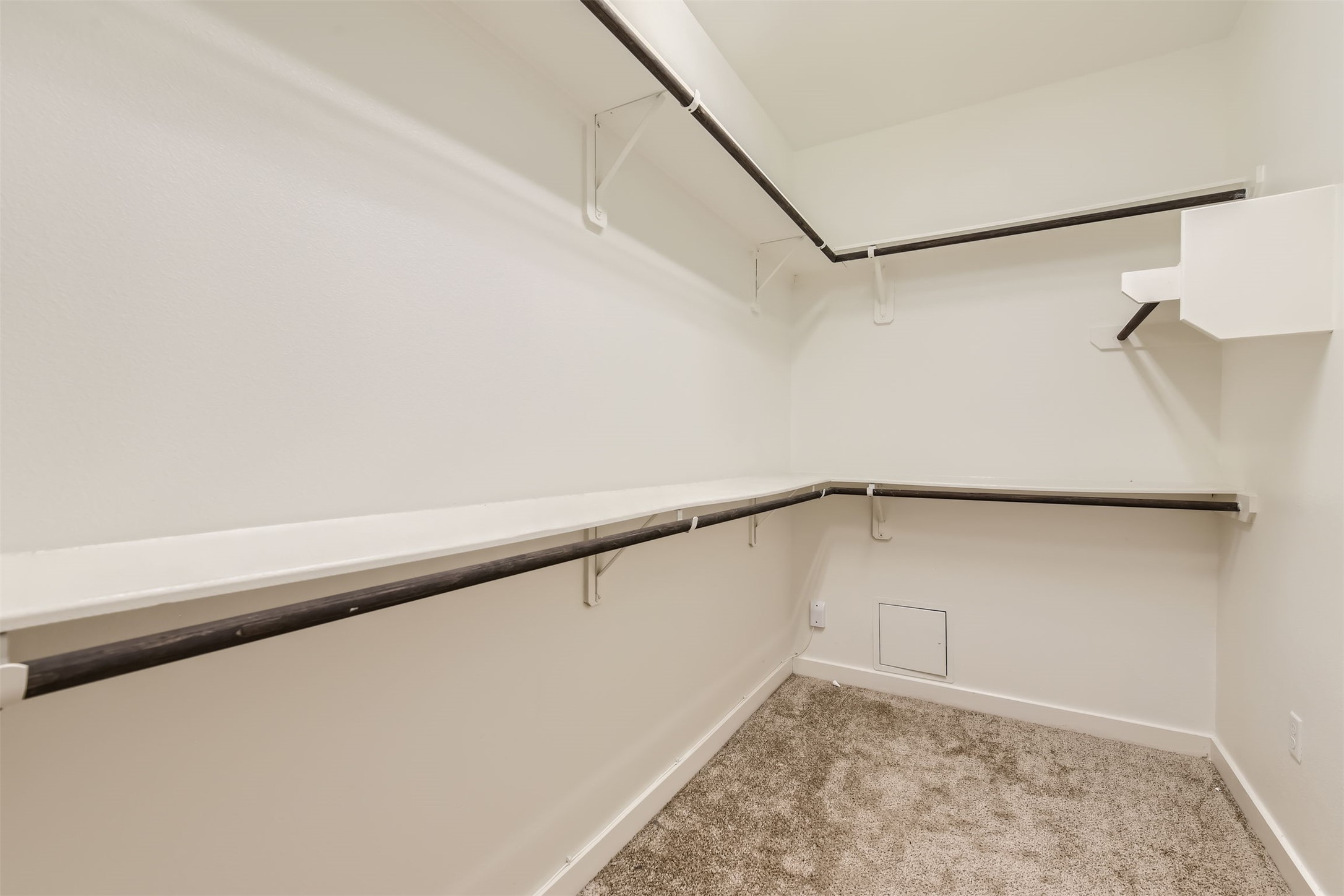 8313 Spire View Austin, TX 78744 - Photo 18 of 33 Ample storage solutions await within this well-appointed walk-in closet.