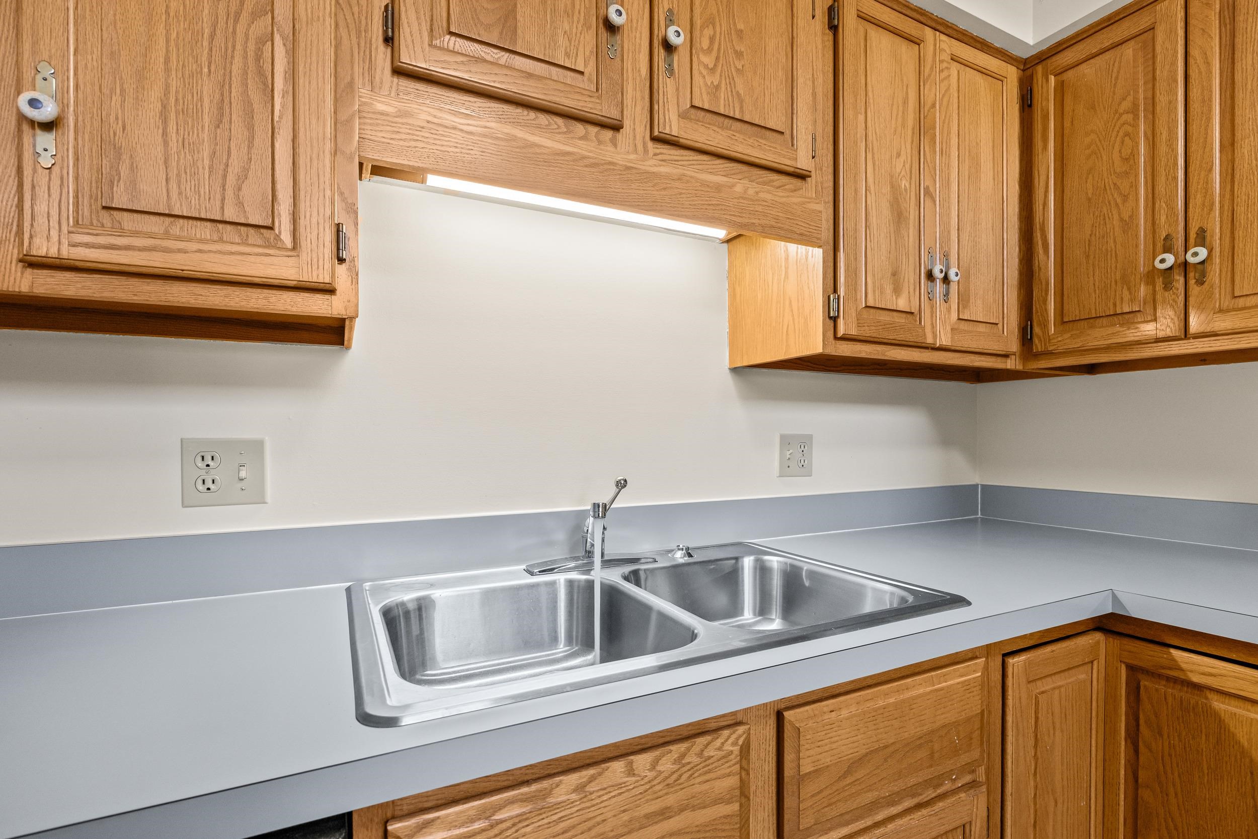1093 Rosedale Drive Harrisonburg, VA 22801 - Photo 20 of 41 a kitchen with stainless steel appliances granite countertop a sink and cabinets