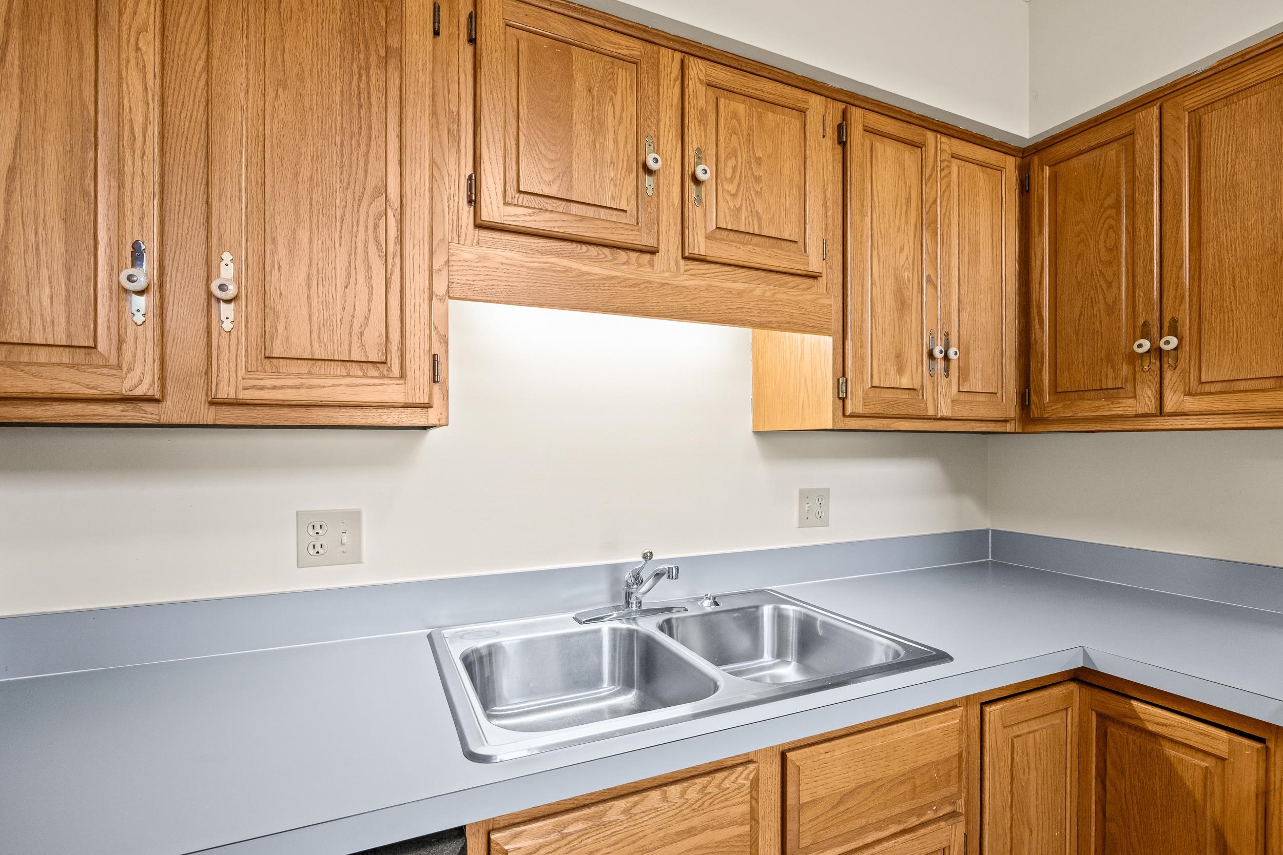 1093 Rosedale Drive Harrisonburg, VA 22801 - Photo 21 of 41 a kitchen with stainless steel appliances granite countertop white cabinets a sink and dishwasher