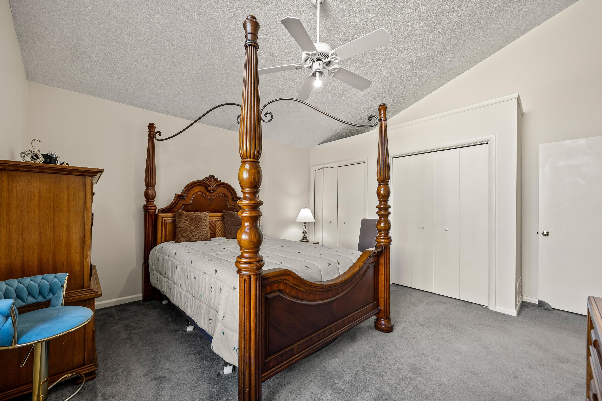 1093 Rosedale Drive Harrisonburg, VA 22801 - Photo 27 of 41 a bed room with a bed and a chandelier