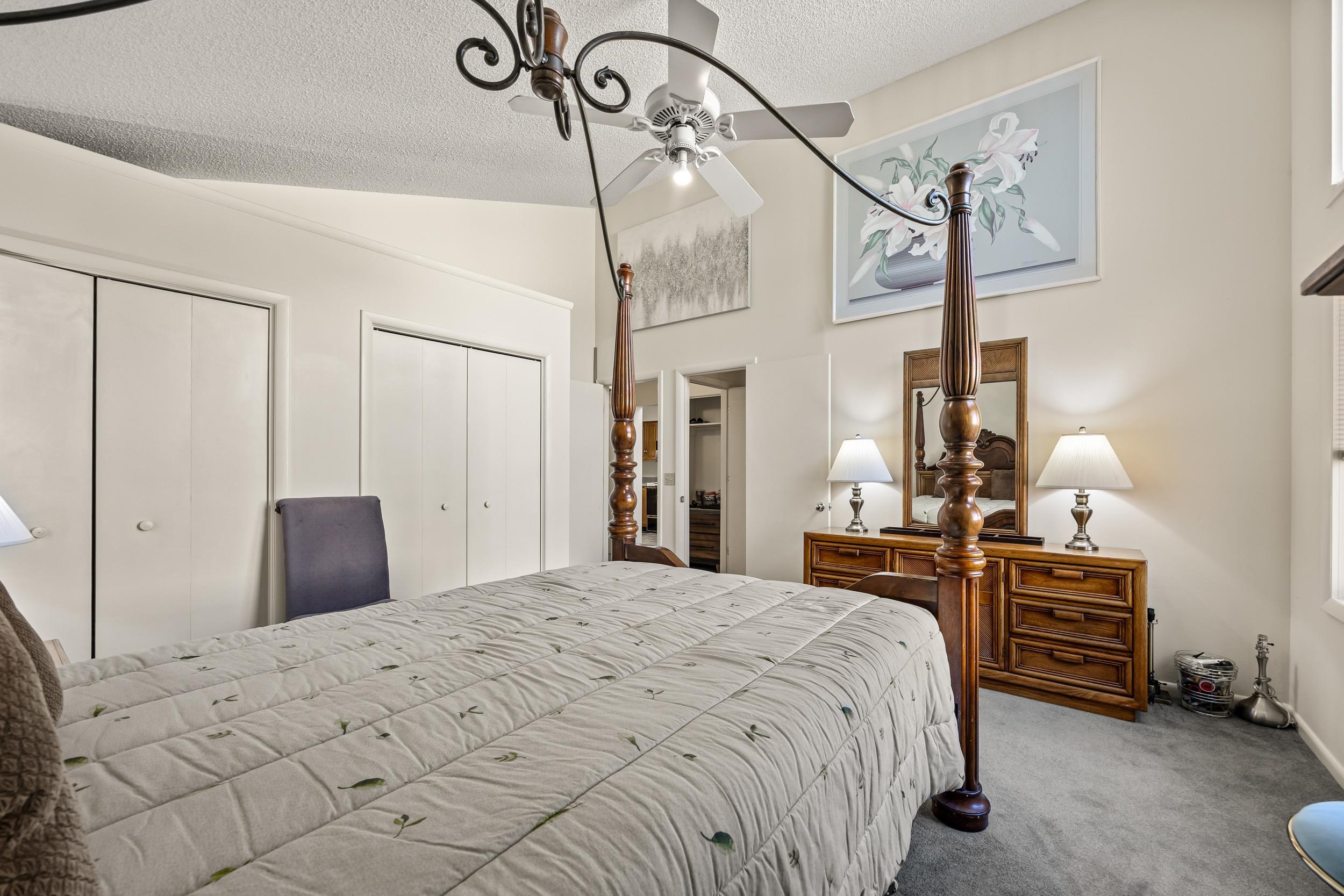 1093 Rosedale Drive Harrisonburg, VA 22801 - Photo 28 of 41 a bedroom with a bed a lamp and a large closet