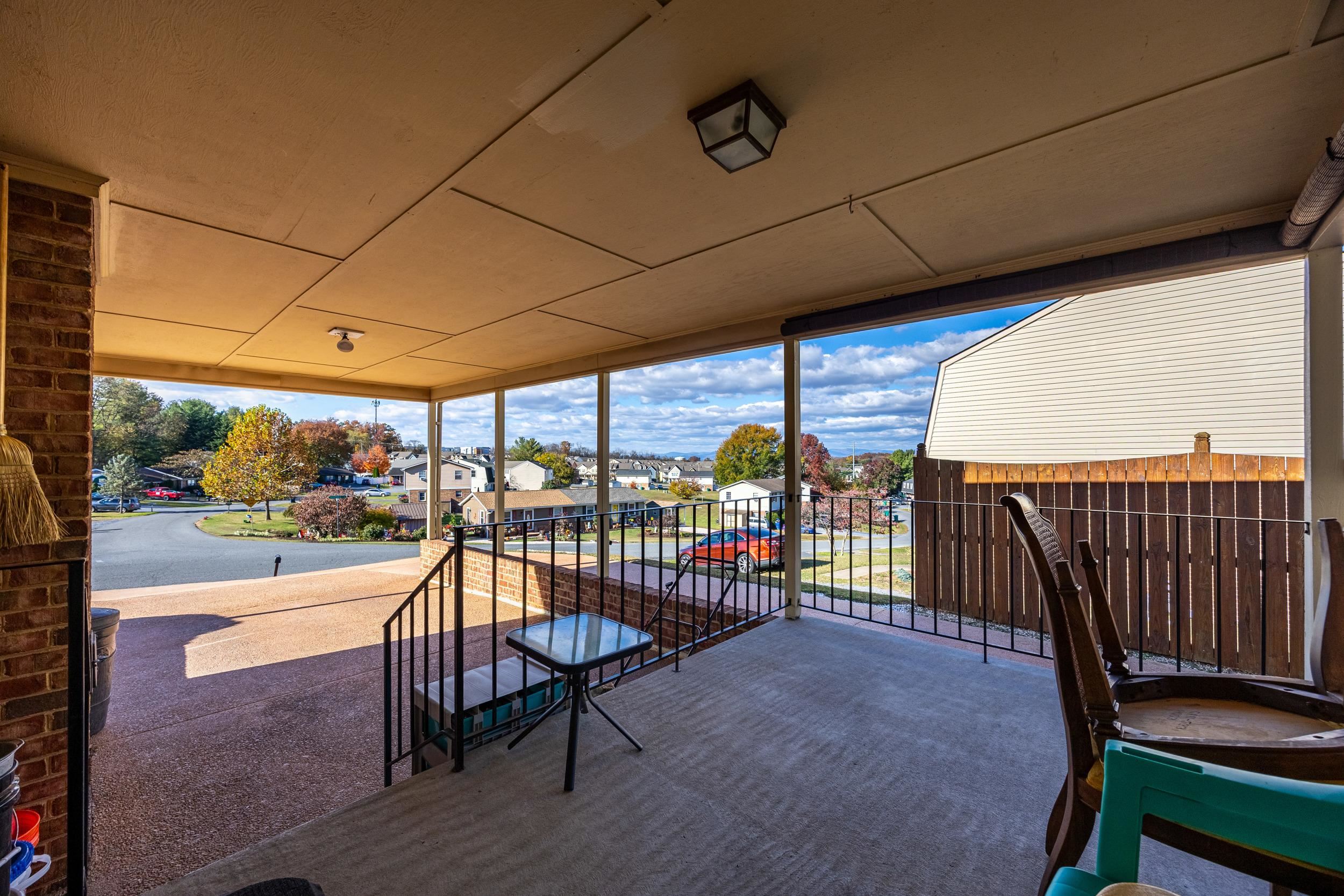 1093 Rosedale Drive Harrisonburg, VA 22801 - Photo 32 of 41 a view of a patio with a table and chairs