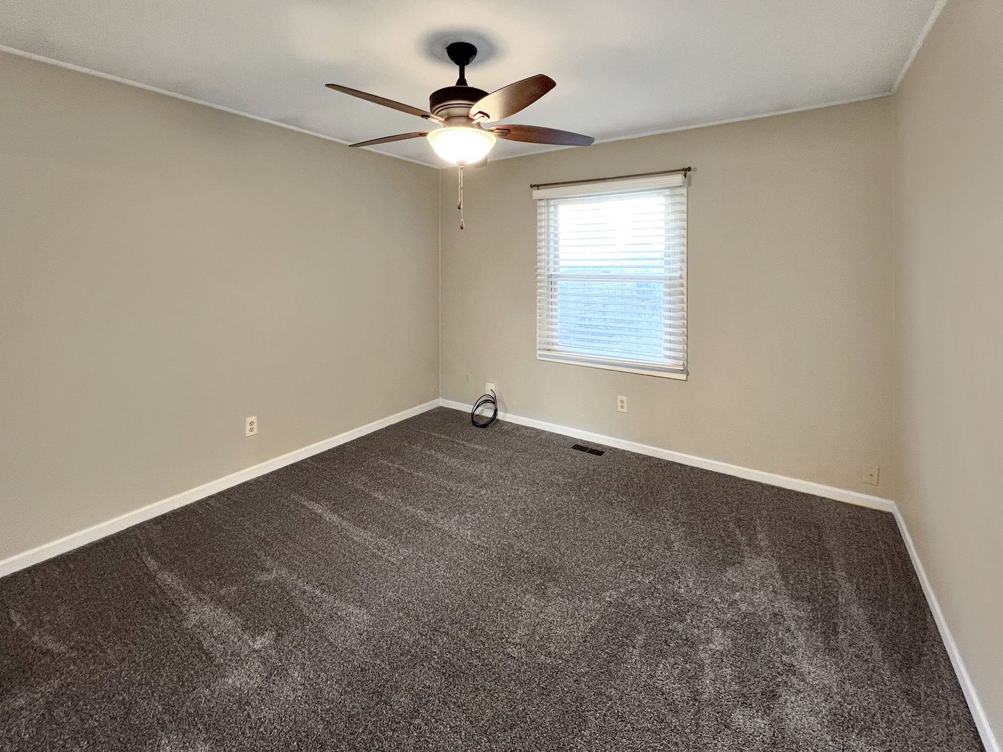 1815 Beach Road McHenry, IL 60050 - Photo 7 of 12 an empty room with a window