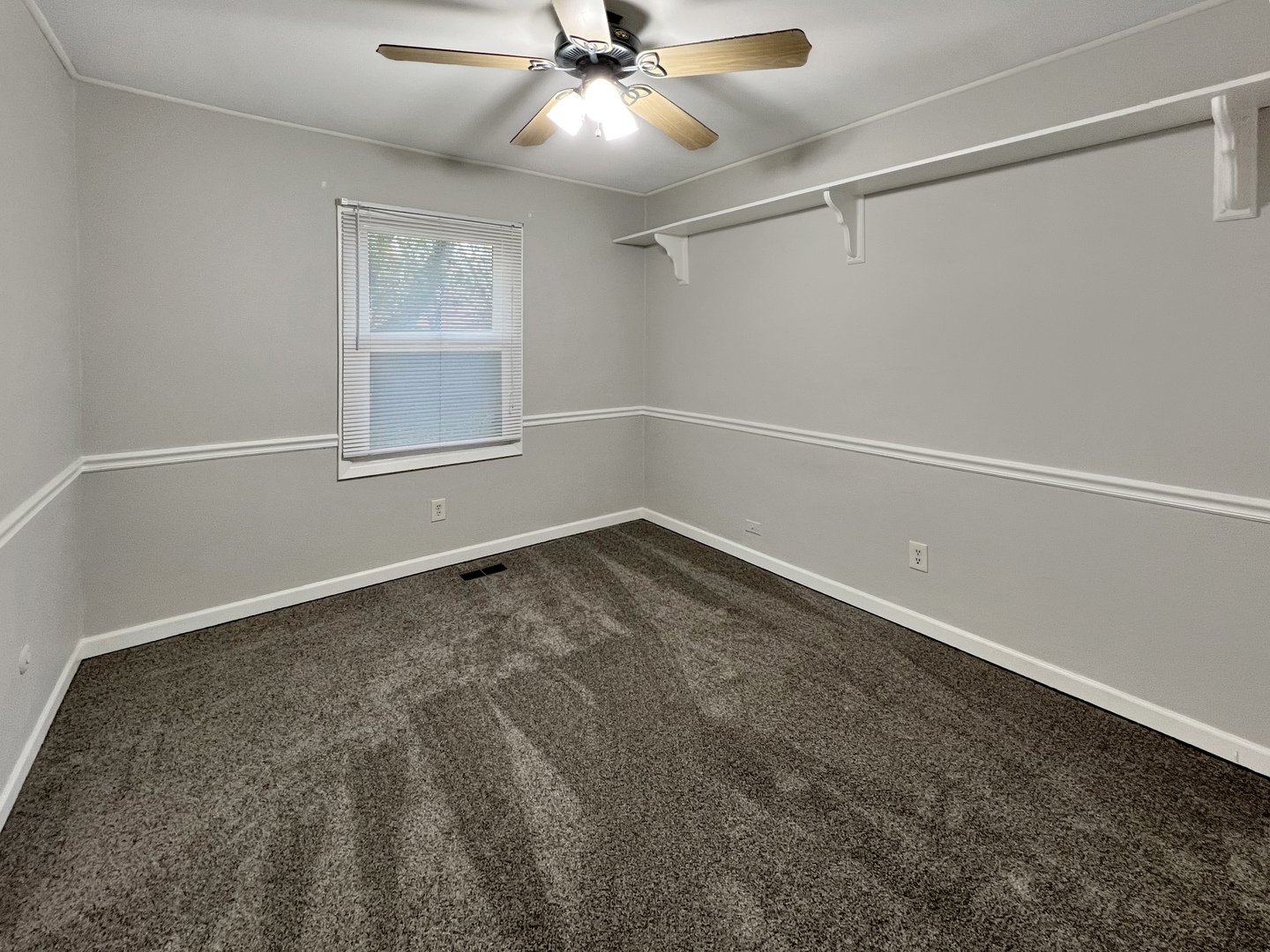 1815 Beach Road McHenry, IL 60050 - Photo 8 of 12 a view of an empty room with a window