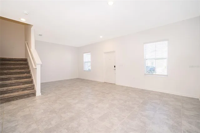 an empty room with windows