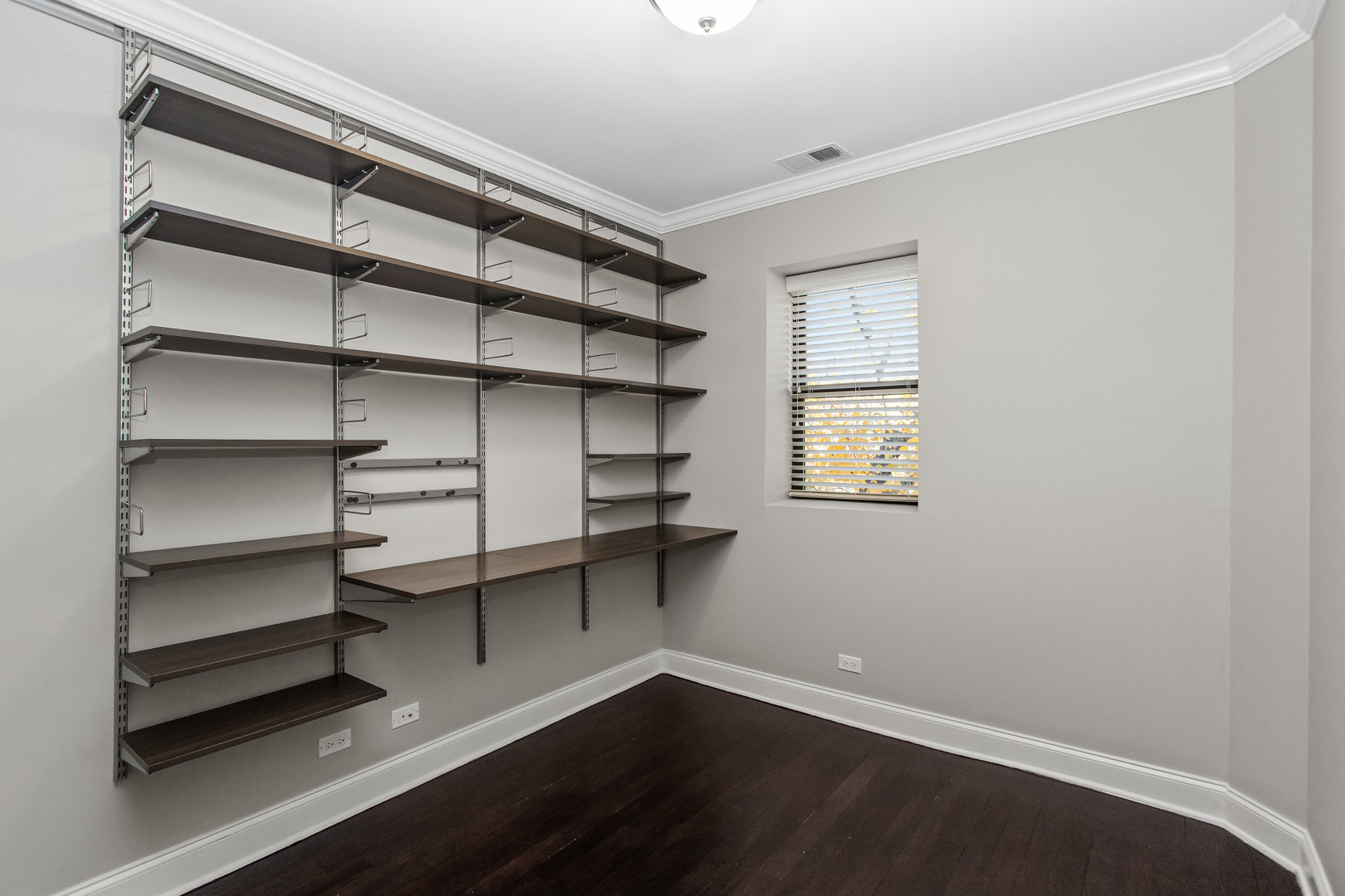 4444 North Damen Avenue, Unit 4E Chicago, IL 60625 - Photo 15 of 25 a view of a room with shelf on the wall