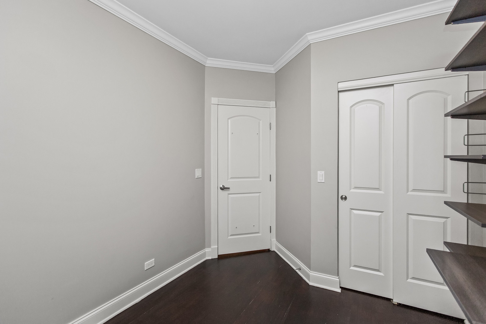 4444 North Damen Avenue, Unit 4E Chicago, IL 60625 - Photo 16 of 25 an empty room with wooden floor and closet
