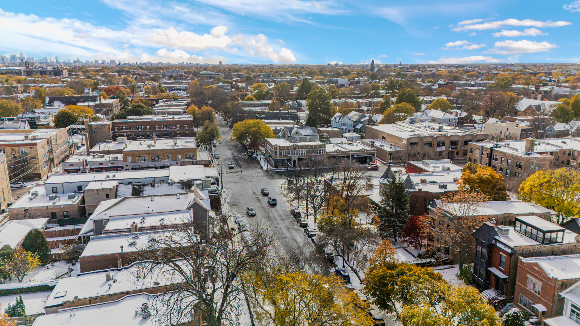 4444 North Damen Avenue, Unit 4E Chicago, IL 60625 - Photo 24 of 25 an aerial view of residential houses with city view