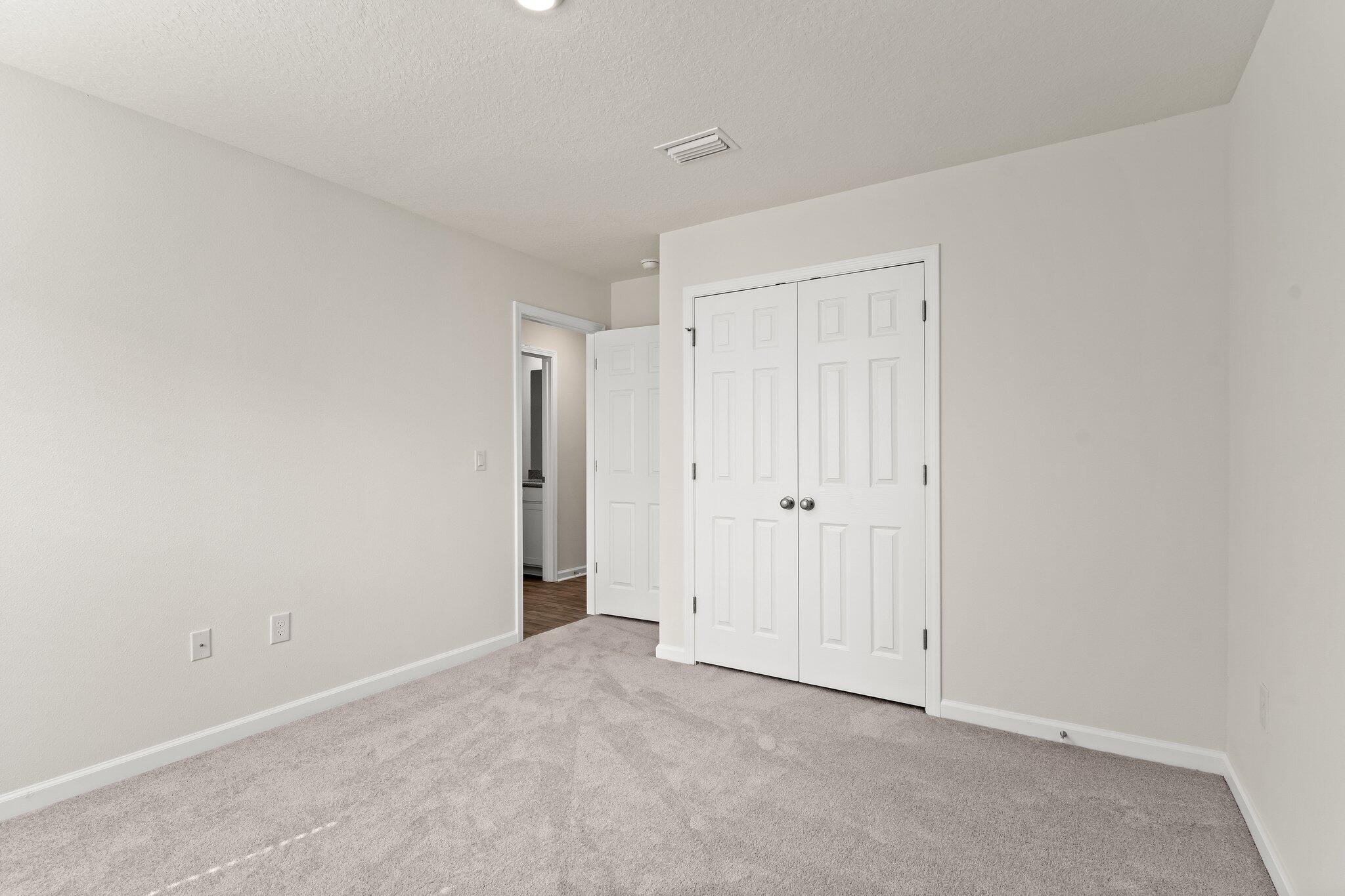 794 Riverwalk Circle Freeport, FL 32439 - Photo 15 of 31 a view of an empty room