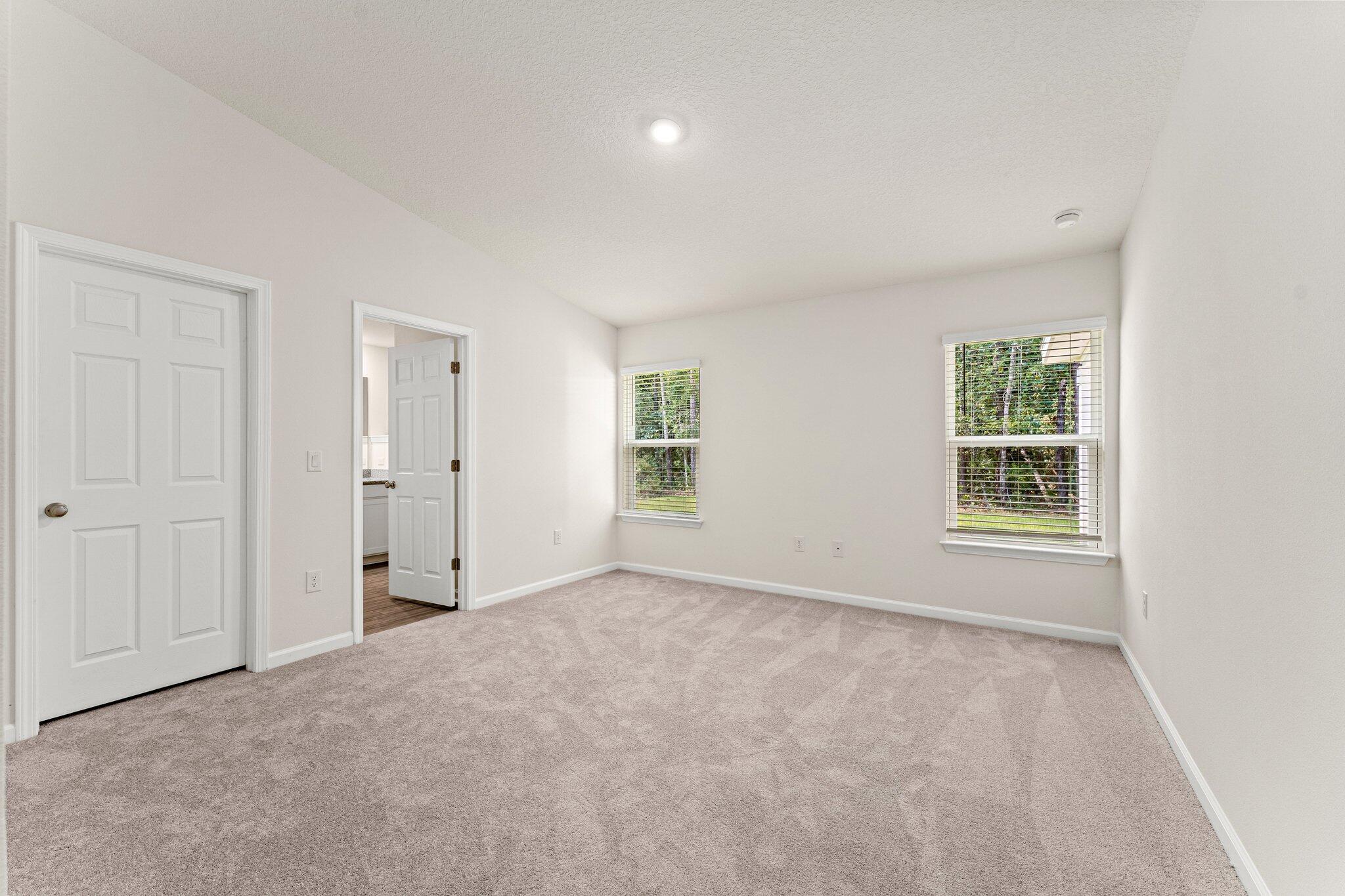 794 Riverwalk Circle Freeport, FL 32439 - Photo 23 of 31 a view of an empty room with a window