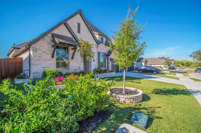 a backyard of a house with lots of green space