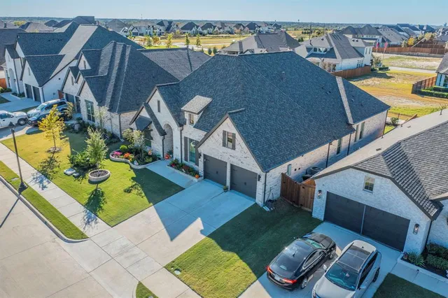a aerial view of a house with swimming pool